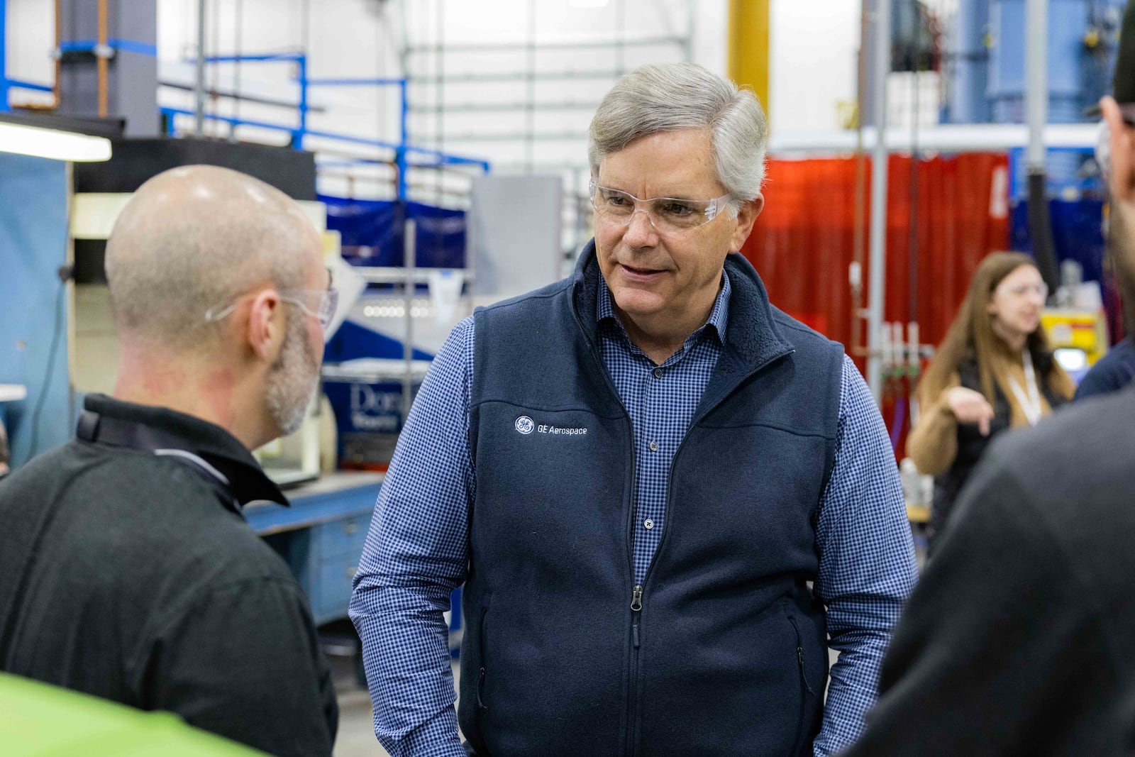 Larry Culp, chairman and CEO of GE Aerospace, with an unnamed employee at the company's Beavercreek plant. GE Aerospace photo.