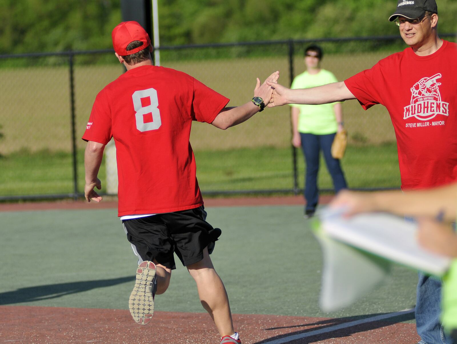 Game action on Friday, May 13, 2016, in the second week of the Joe Nuxhall Miracle League Field in Fairfield. MICHAEL D. PITMAN/STAFF