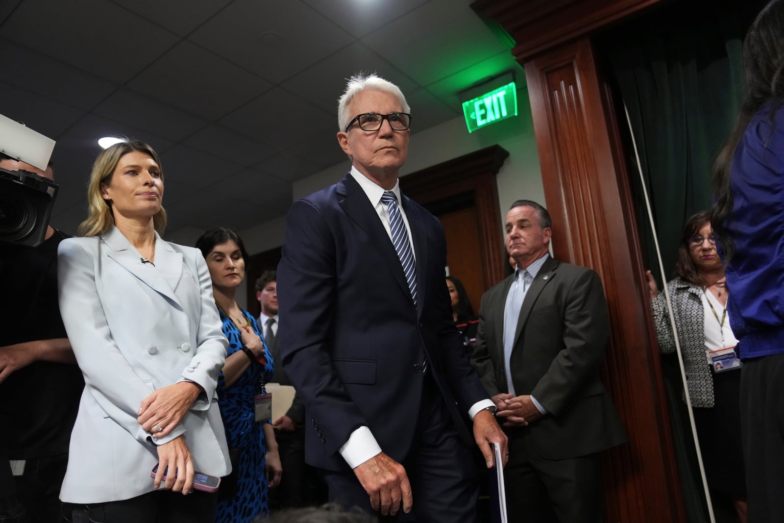 Los Angeles County District Attorney George Gascon, center, arrives at a news conference at the Hall of Justice on Thursday, Oct. 24, 2024, in Los Angeles. (AP Photo/Eric Thayer)