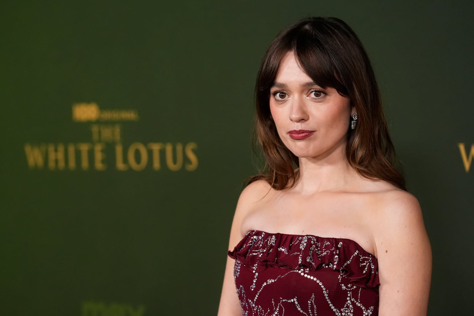 Aimee Lou Wood arrives at the season three premiere of "The White Lotus" on Monday, Feb. 10, 2025, at Paramount Theater in Los Angeles. (AP Photo/Chris Pizzello)