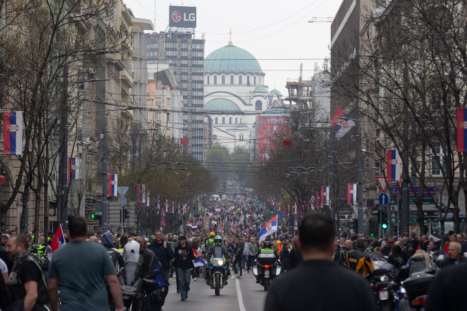 People gather on a street during a major anti-corruption rally led by university students in Belgrade, Serbia, Saturday, March 15, 2025. (AP Photo/Marko Drobnjakovic)