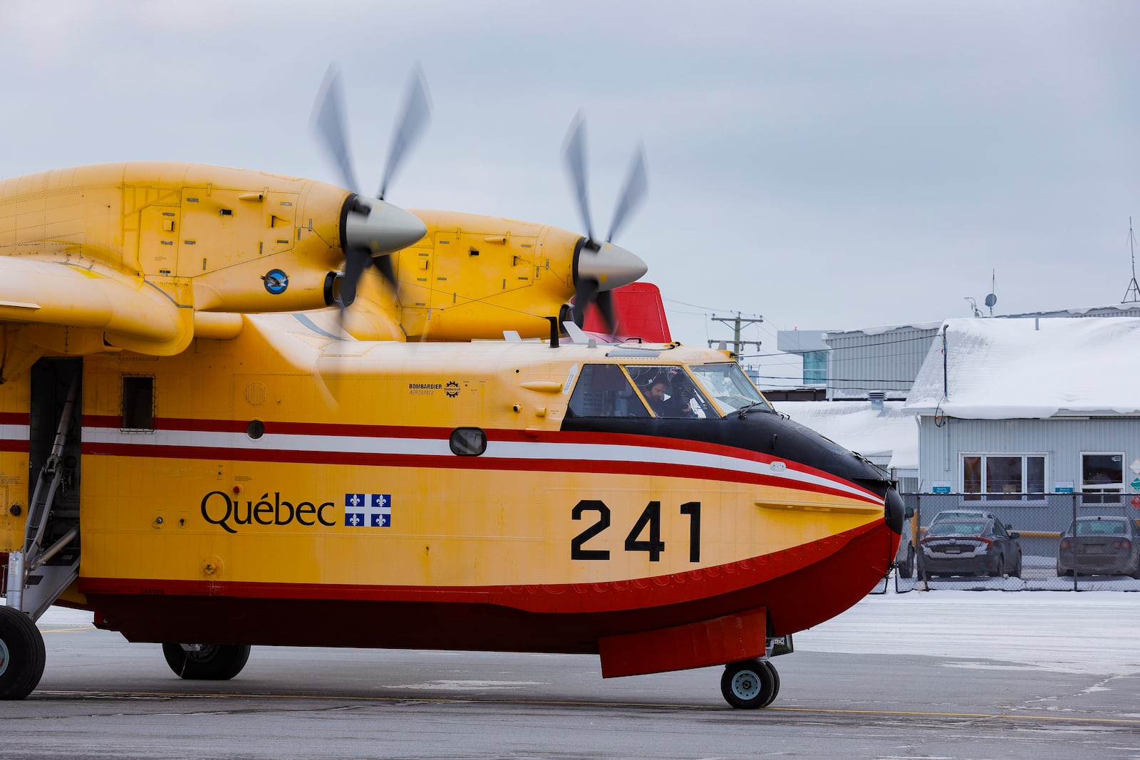 A SOPFEU CL-415 is taxiing for takeoff to help in the California wildfires at the Quebec City airport, Wednesday, Jan. 15, 2025. (Francis Vachon/The Canadian Press via AP)