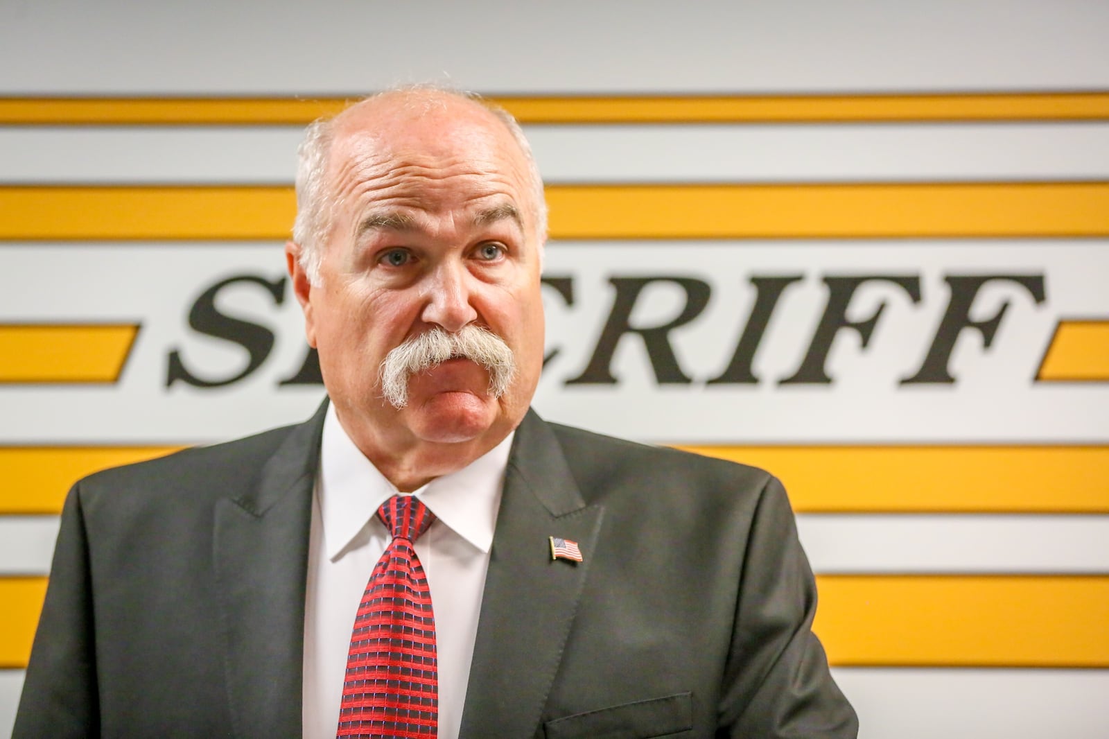 Butler County Sheriff Richard Jones warns residents about a scam in which a caller poses as a sheriff’s employee demanding money. GREG LYNCH / STAFF