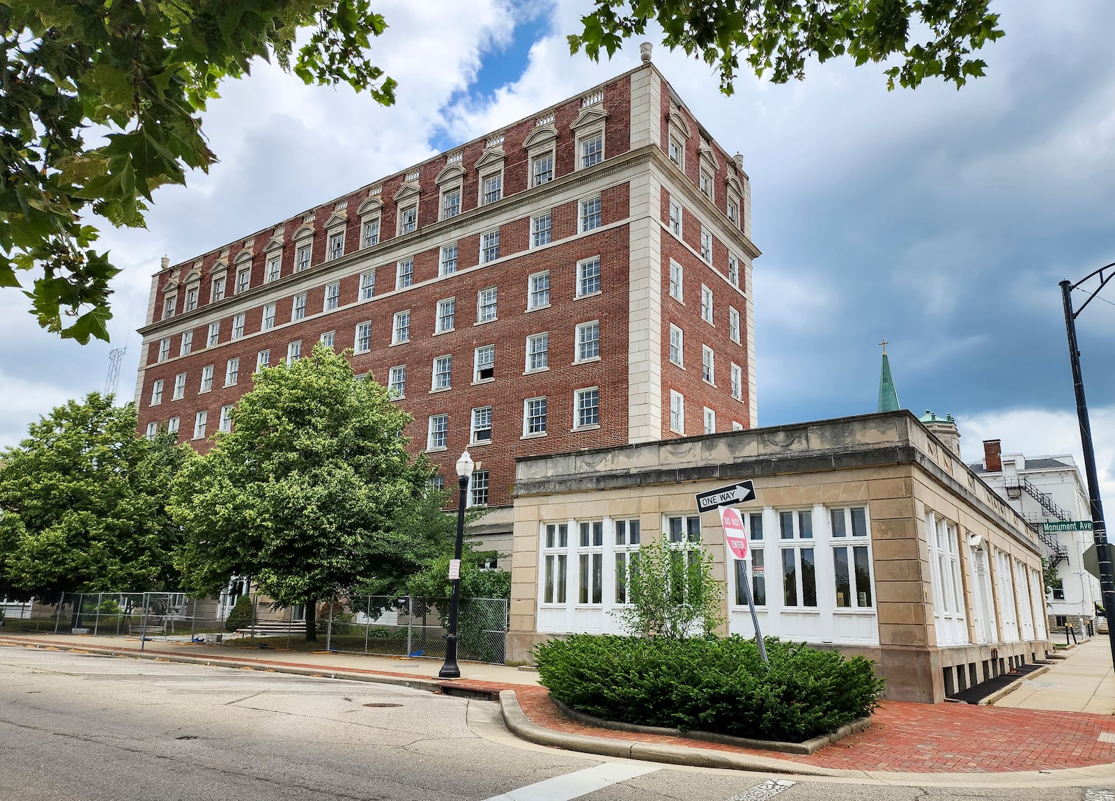 The Well House Hotel in former Anthony Wayne apartments building is expected to be awarded historic Ohio tax credits by the end of June, which will allow the developer to move onto exterior work after July 1. This will create a boutique hotel that will benefit from the activities at Spooky Nook as well as The Fitton Center. A sign on Front Street indicates the road will be closed permanently on July 1. NICK GRAHAM/STAFF