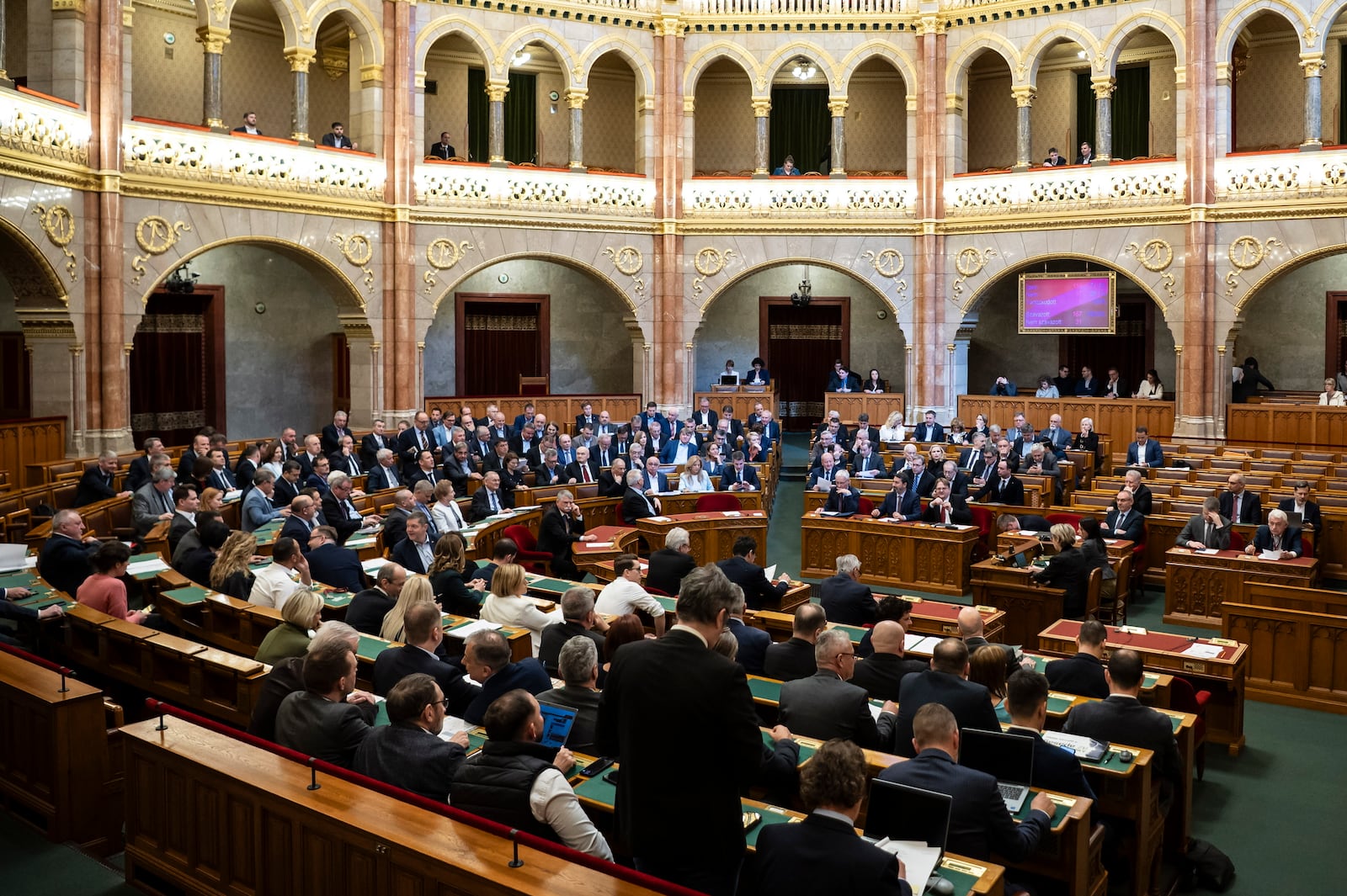 Representatives vote during the plenary session of the Hungarian parliament in Budapest, Hungary, Tuesday, March 18, 2025. (Boglarka Bodnar/MTI via AP)