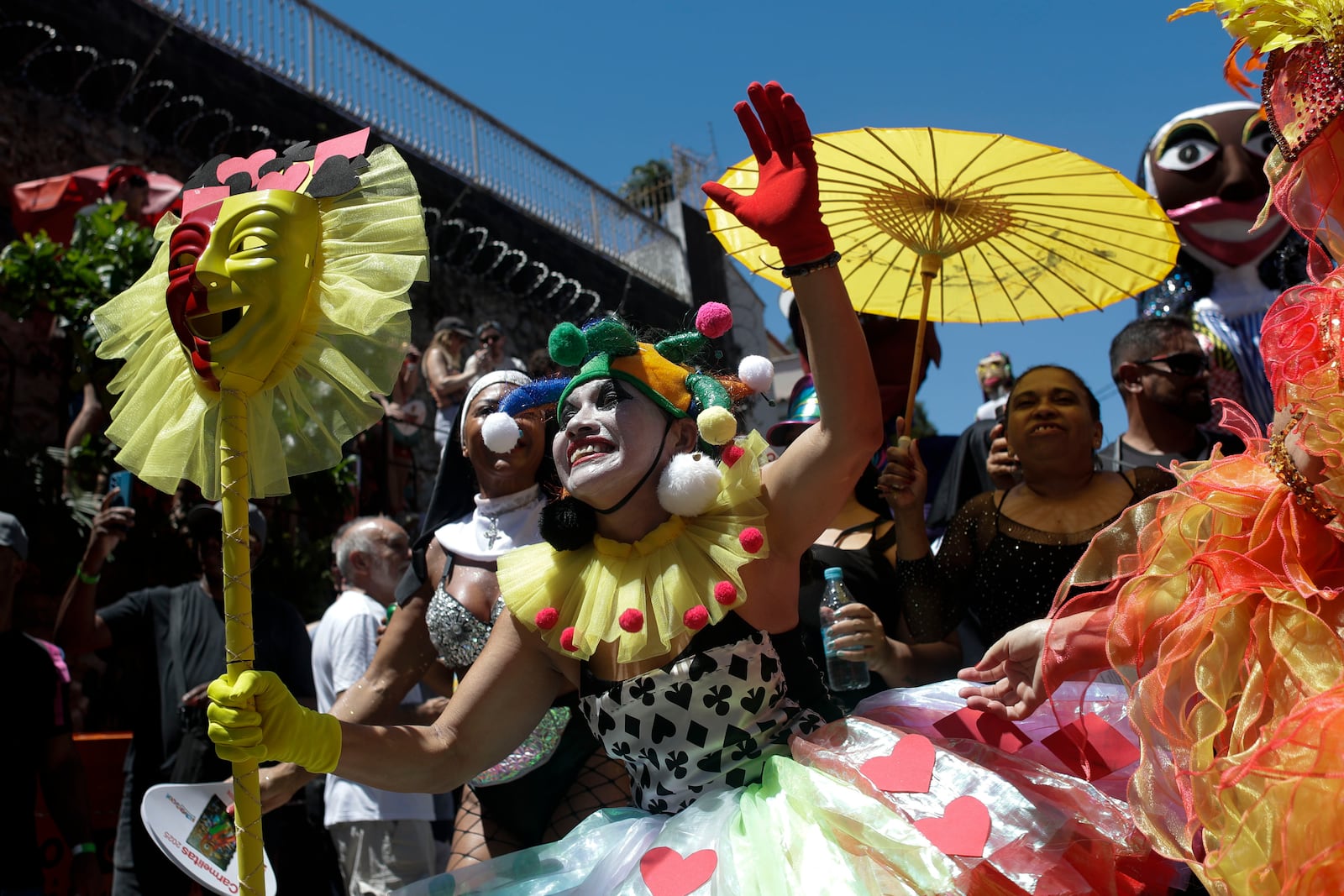 Revelers attend the Carmelitas street party on the first official day of Carnival in Rio de Janeiro, Friday, Feb. 28, 2025. (AP Photo/Bruna Prado)