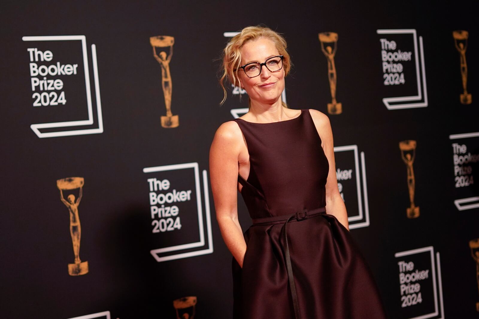 Gillian Anderson arrives at the Booker Prize award dinner in London, Tuesday, Nov. 12, 2024. (AP Photo/Alberto Pezzali)