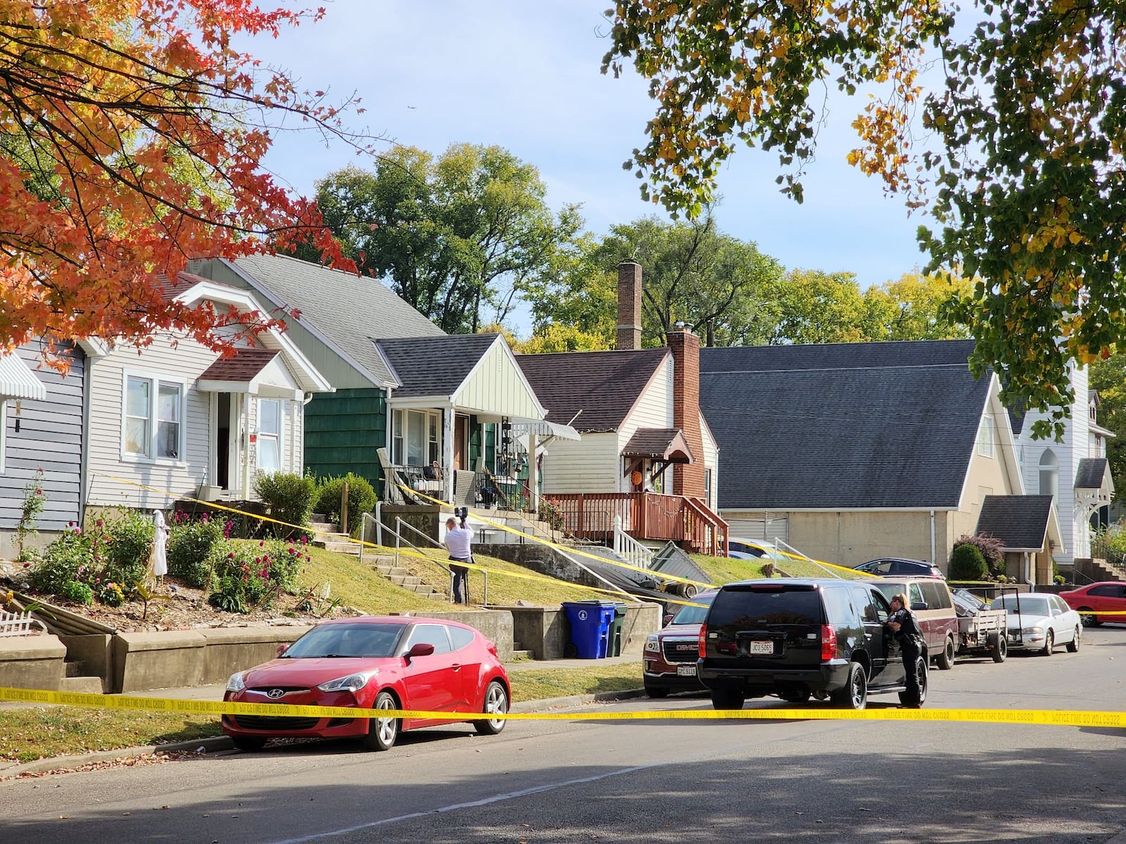 Hamilton police are investigating a death at a home in the 1200 block of Parrish Avenue. Pictured are investigators at the home on Oct. 11, 2022. NICK GRAHAM/STAFF