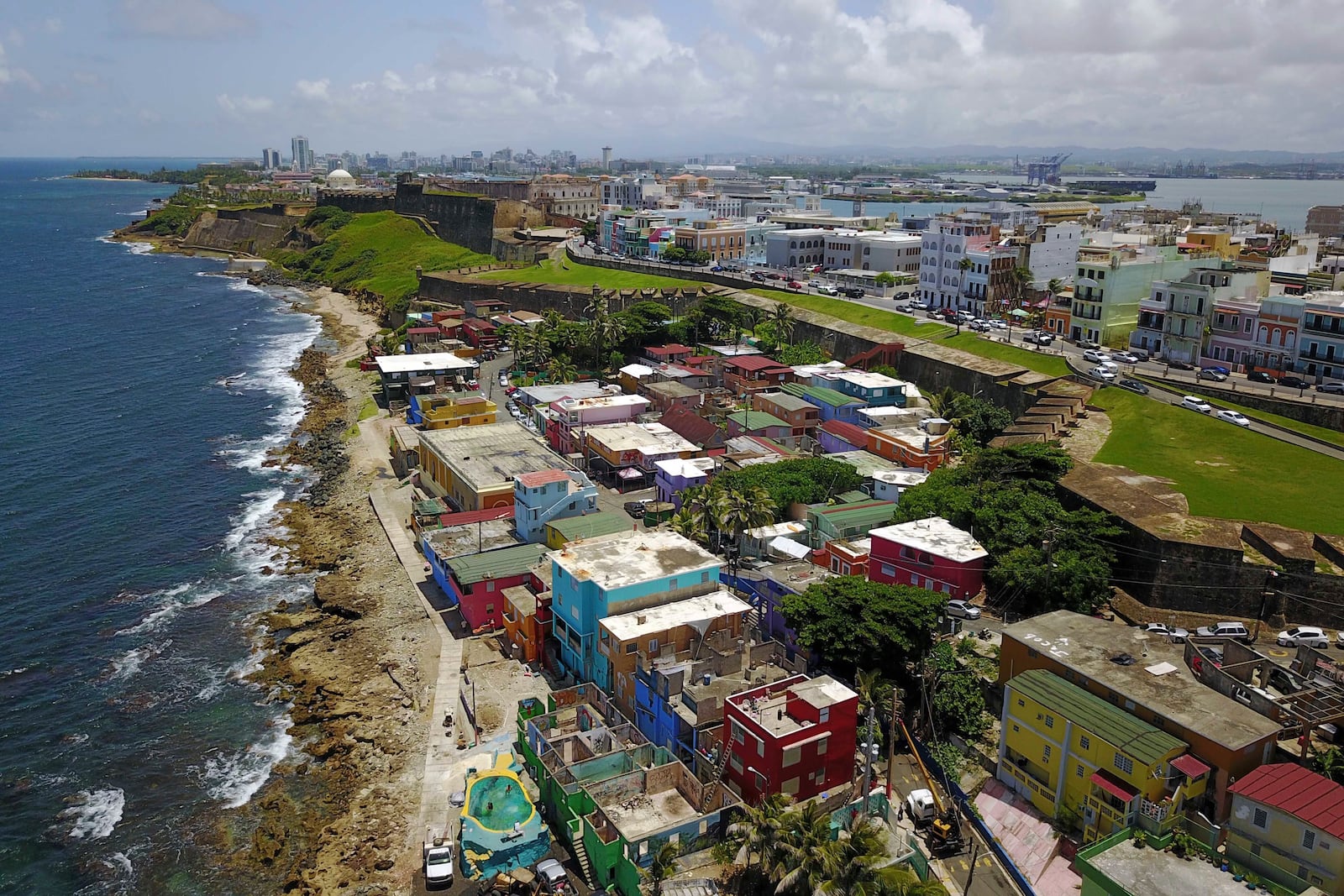 FILE - An aerial view of the seaside neighborhood of La Perla, in San Juan, Puerto Rico, is seen on Aug. 25, 2017. (AP Photo/Ricardo Arduengo, File)