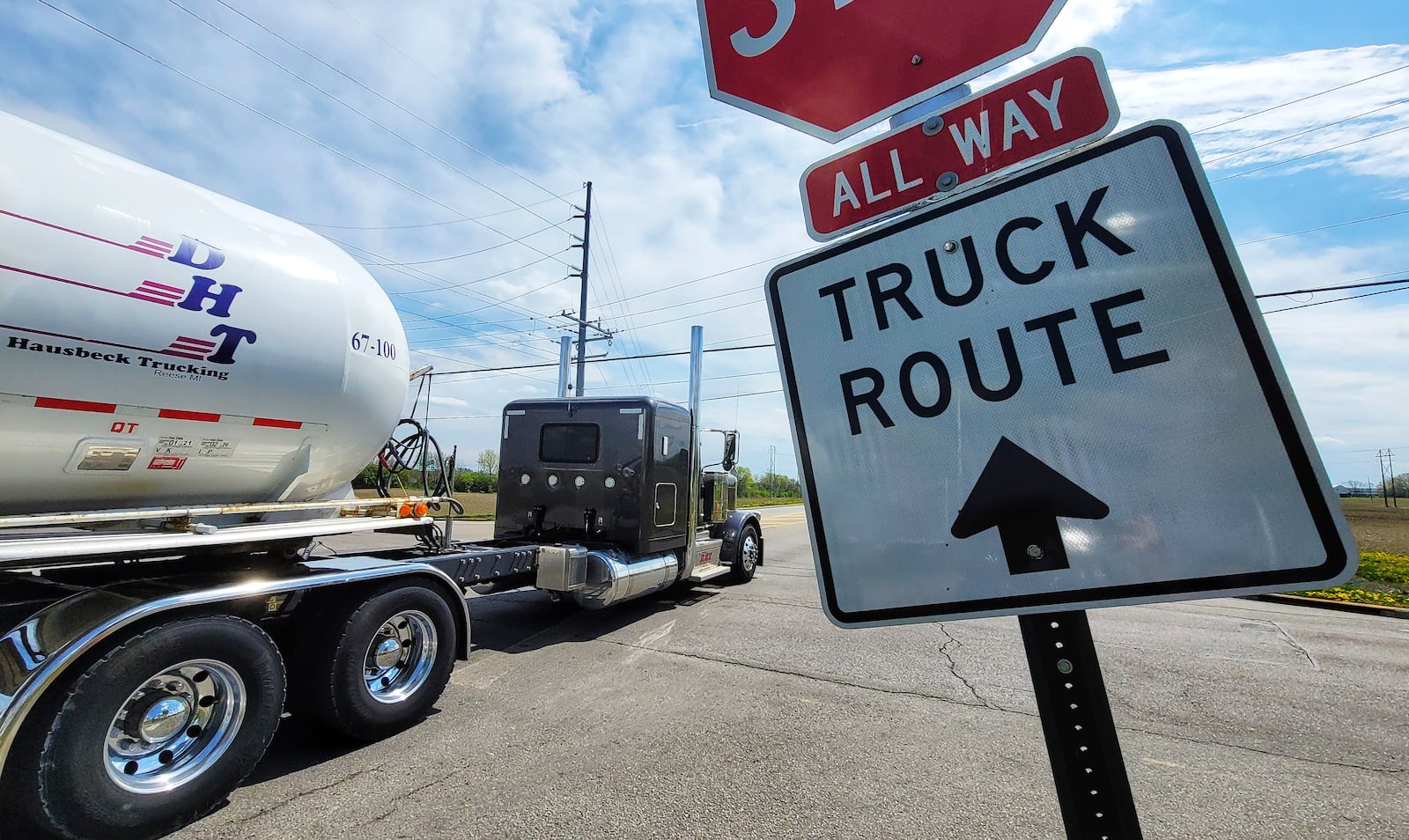 This truck driver follows the signs as he crosses over Yankee Road to Todhunter Road in Monroe. Residents say too many truck drivers disobey the signs. NICK GRAHAM/STAFF