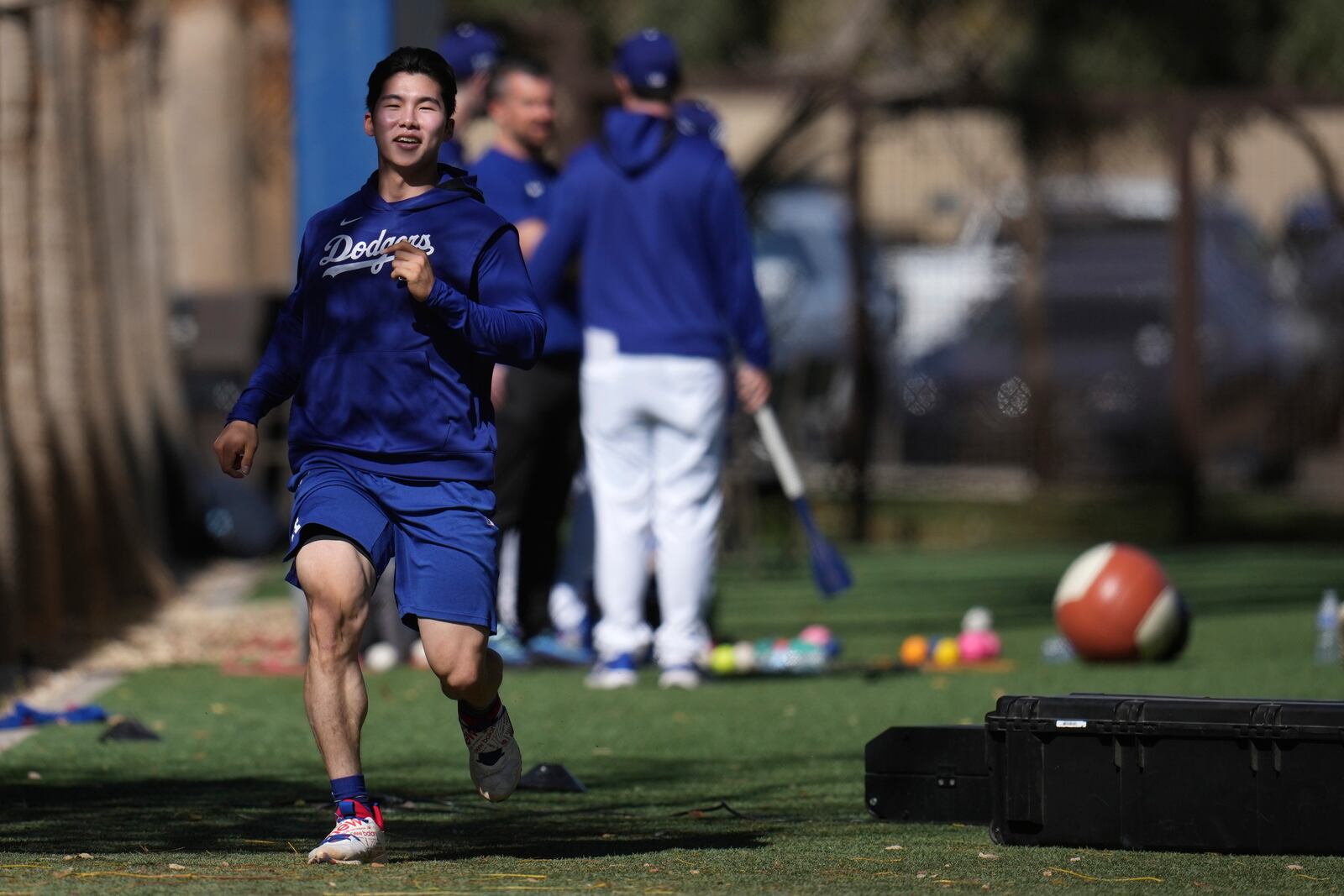 Los Angeles Dodgers' Hyeseong Kim, of South Korea, works out at the Dodgers baseball spring training facility, Tuesday, Feb. 11, 2025, in Phoenix. (AP Photo/Ross D. Franklin)