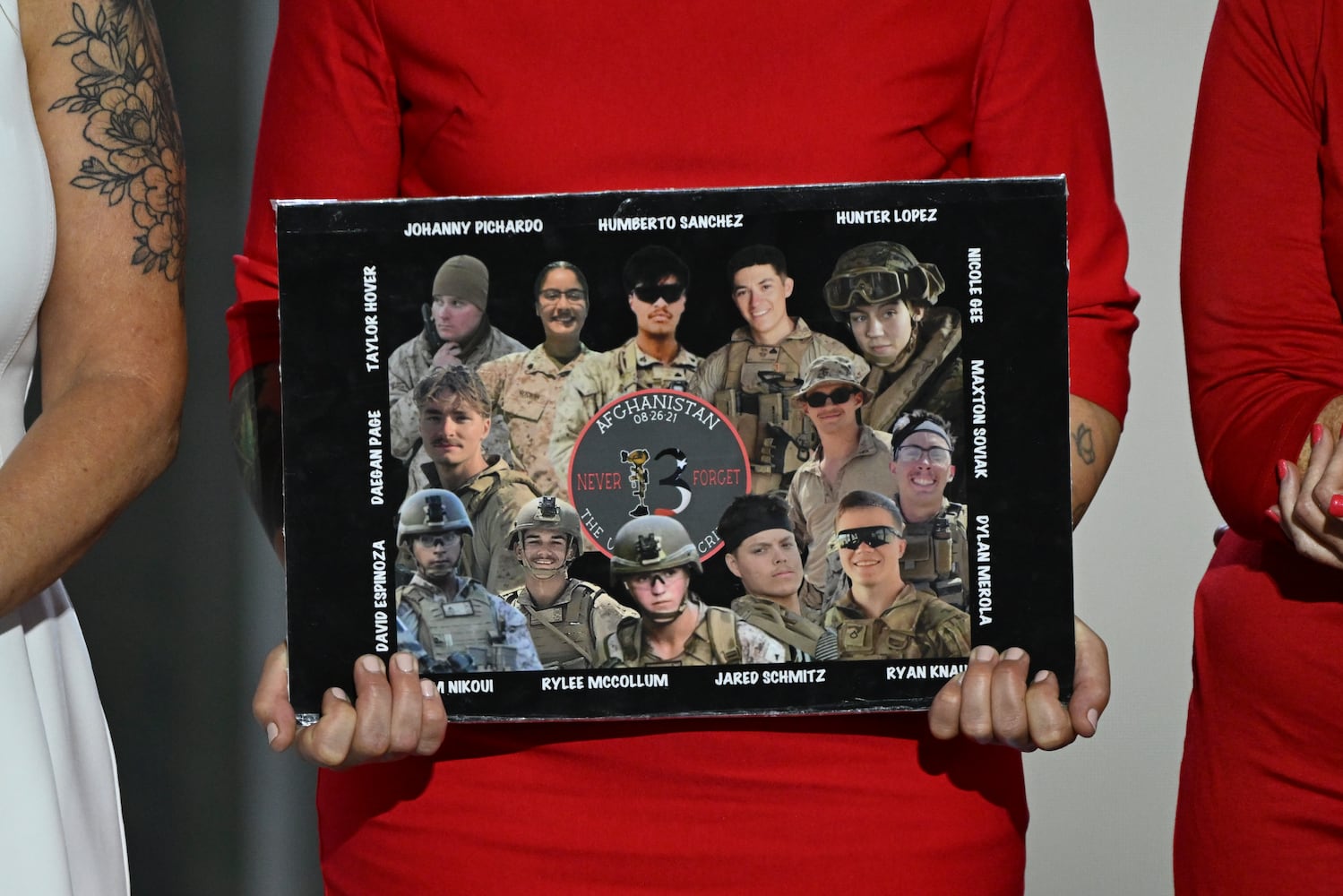 
                        Relatives of some of the 13 U.S. service members killed in the August 2021 bombing at the Kabul airport’s Abbey Gate speak on the third night of the Republican National Convention at the Fiserv Forum in Milwaukee, on Wednesday, July 17, 2024. (Kenny Holston/The New York Times)
                      