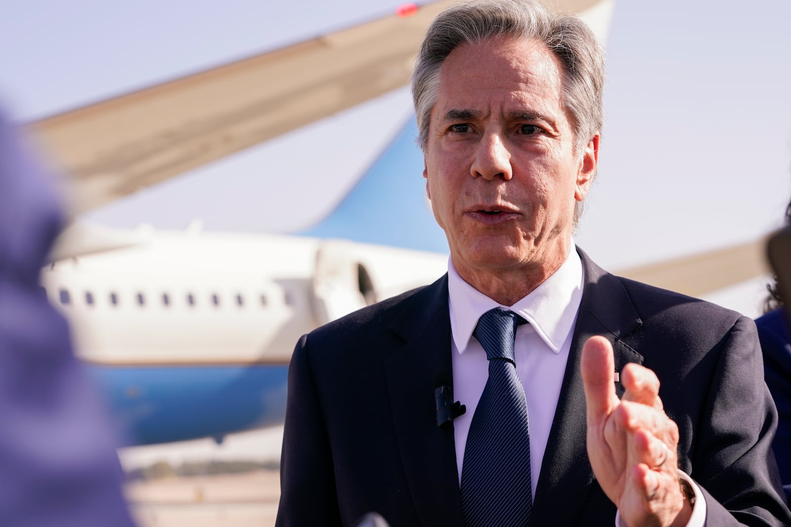 U.S. Secretary of State Antony Blinken speaks with members of the media as he arrives at Ben Gurion International Airport before departing for Riyadh, Saudi Arabia, in Tel Aviv, Israel, Wednesday, Oct. 23, 2024. (Nathan Howard/Pool Photo via AP)