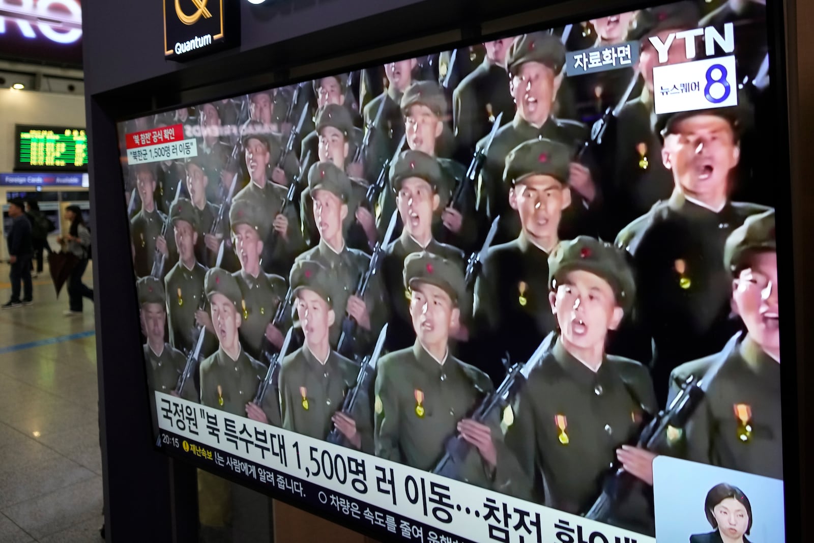 A TV screen shows file images of North Korean soldiers during a news program at Seoul Railway Station in Seoul, South Korea, Friday, Oct. 18, 2024. (AP Photo/Ahn Young-joon)