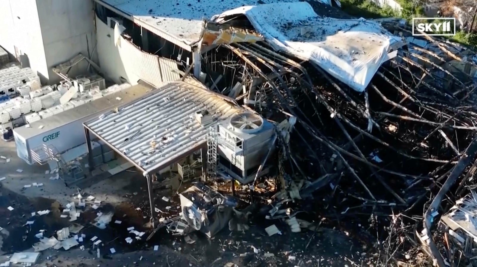 This image taken from video from WHAS 11 News shows damage after an explosion injured multiple employees at Givaudan Sense Color, Tuesday, Nov. 12, 2024, in Louisville, Ky. (WHAS 11 News via AP)