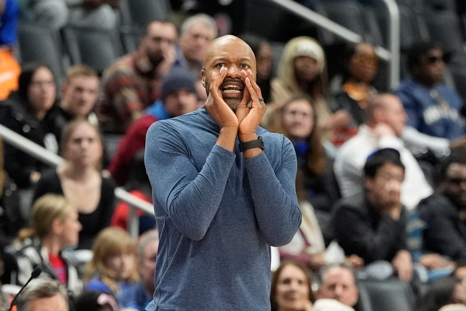 Orlando Magic head coach Jamahl Mosley yells during the first half of an NBA basketball game against the Detroit Pistons, Wednesday, Jan. 1, 2025, in Detroit. (AP Photo/Carlos Osorio)