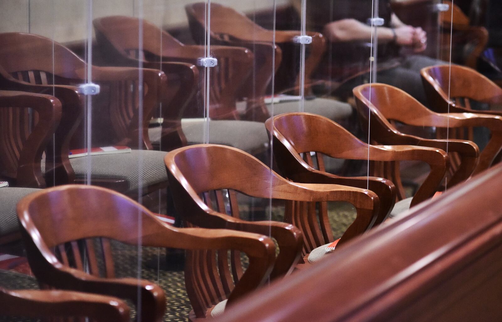 Jurors are divided by transparent panels during the trial of Peyton McFarland for the death of Chris Hacker Tuesday, April 20, 2021 in Butler County Common Pleas Court in Hamilton. The defense says McFarland acted in self defense when he stabbed Chris Hacker to death at their Monroe residence. NICK GRAHAM / STAFF