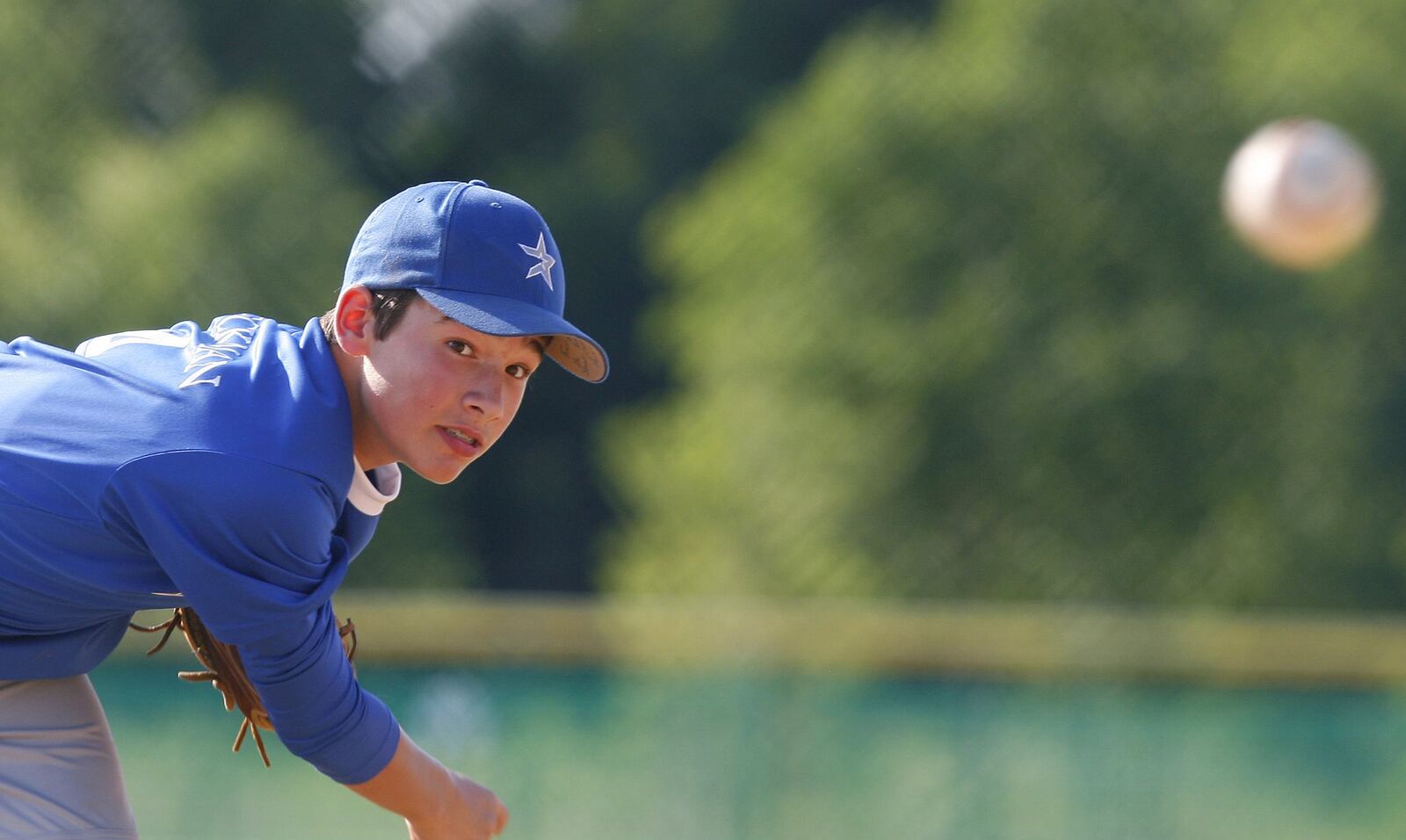 West Side Little League’s John Heckman throws a pitch during a District 9 tournament game against Mason on July 7, 2009, at Oxford Community Park. West Side won 20-0. NICK GRAHAM/STAFF