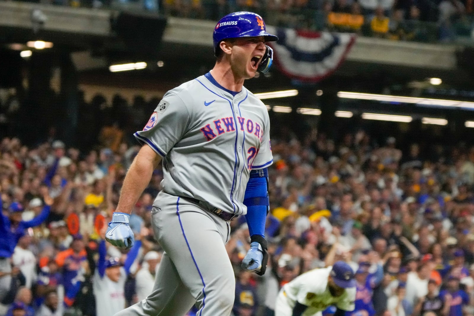 FILE - New York Mets' Pete Alonso reacts after hitting a three-run home run during the ninth inning of Game 3 of a National League wild card baseball game against the Milwaukee Brewers Thursday, Oct. 3, 2024, in Milwaukee. (AP Photo/Morry Gash, File)