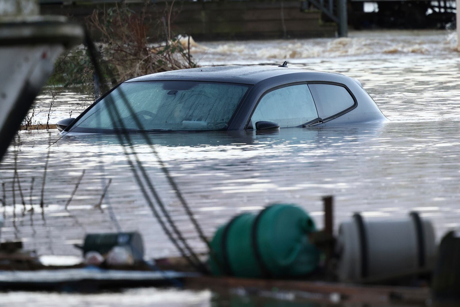 A car sits in the floods of the river Soar in Barrow Upon Soar, England, Tuesday, Jan. 7, 2025.(AP Photo/Darren Staples)