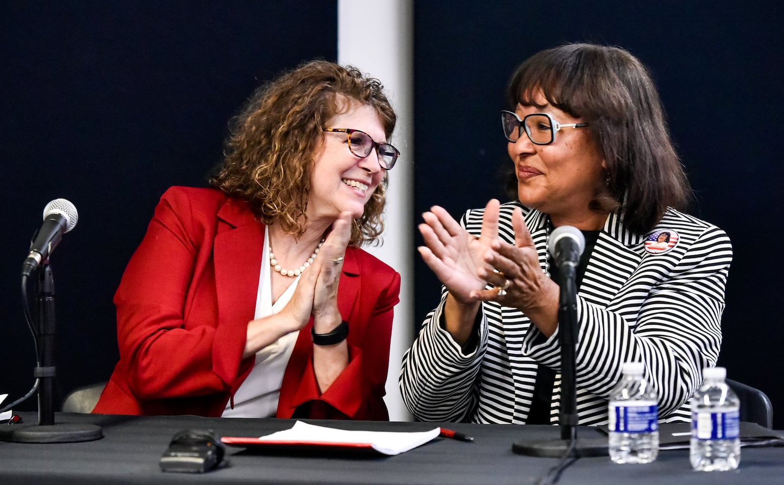 Butler County Commission candidates Cindy Carpenter, the Republican incumbent, left, and Dora Bronston, the Democratic challenger, answered questions during a debate Thursday at Miami University Hamilton Downtown. 