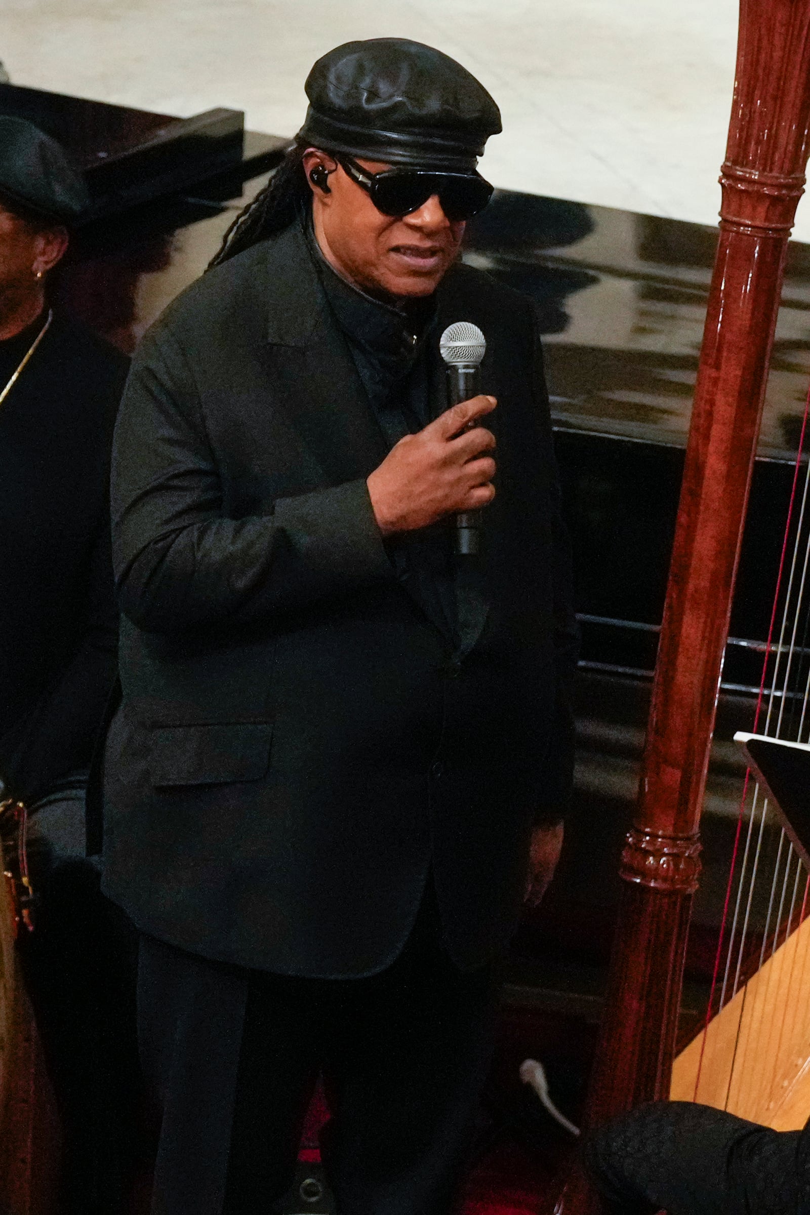 Stevie Wonder performs during a ceremony in celebration of Roberta Flack's life at The Abyssinian Baptist Church on Monday, March 10, 2025, in New York. (AP Photo/Richard Drew)