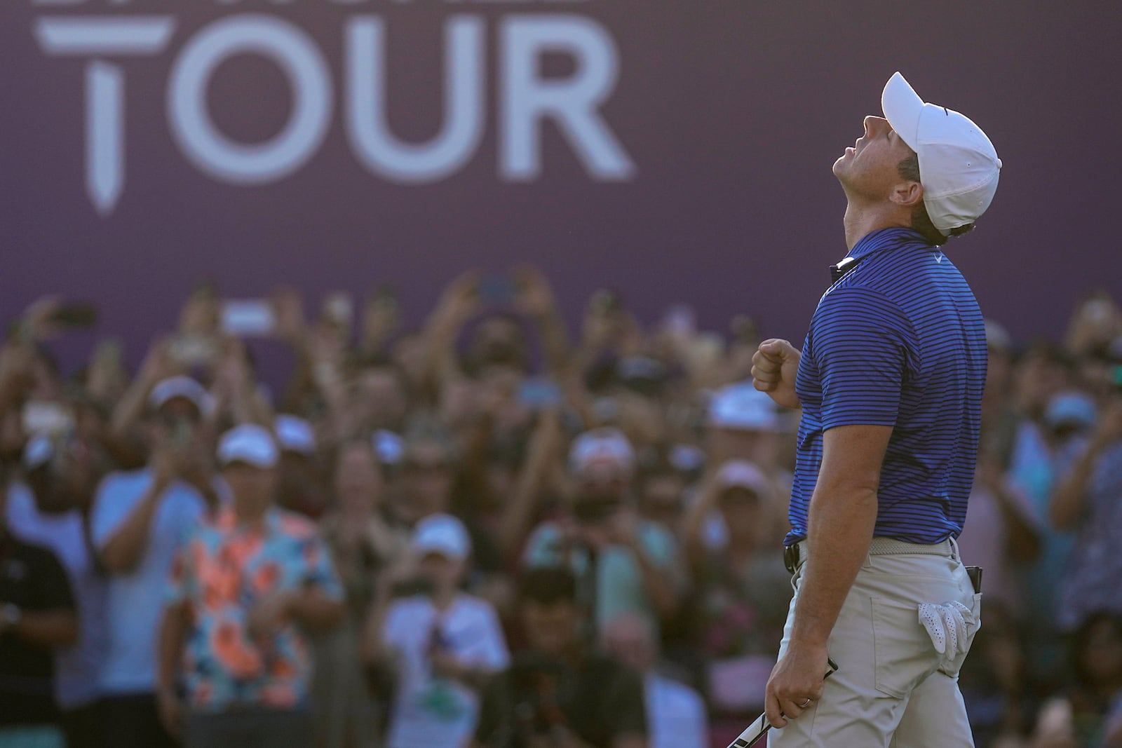 Rory McIlroy of Northern Ireland reacts after winning the World Tour Golf Championship in Dubai, United Arab Emirates, Sunday, Nov. 17, 2024. (AP Photo/Altaf Qadri)