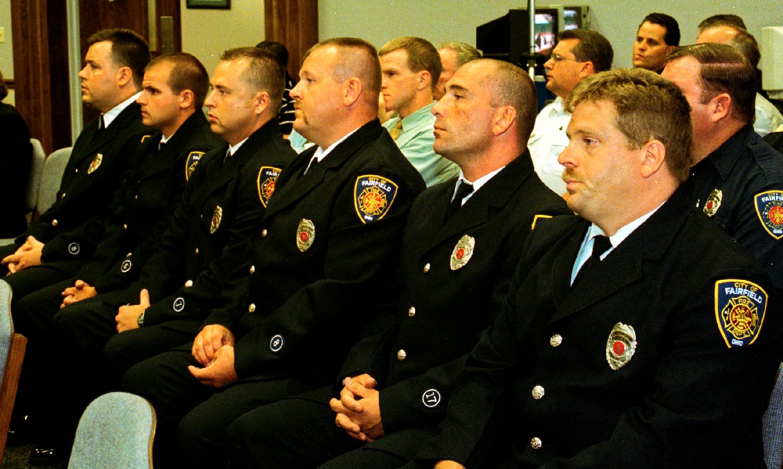 Fairfield Fire Department paramedics wait in council chambers to be congratulated by the city council Monday night.  They are:  Tom Wagner, Randy McCreadie, Jamison Ruhl, Richard Hall, Glenn Sandlin, and Chris Theders.  Ron Lang was absent Monday night.  Paramedics Ruhl and Hall were valedictorians of their class.
John Janco/Journal-News