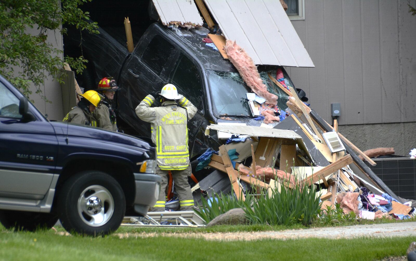 A male driver blacked out and lost control of a pickup truck on Thursday, may 9, 2019, which went through a house on Spruce Hill Drive near Barrett and West Chester roads in West Chester Twp. MICHAEL D. PITMAN/STAFF