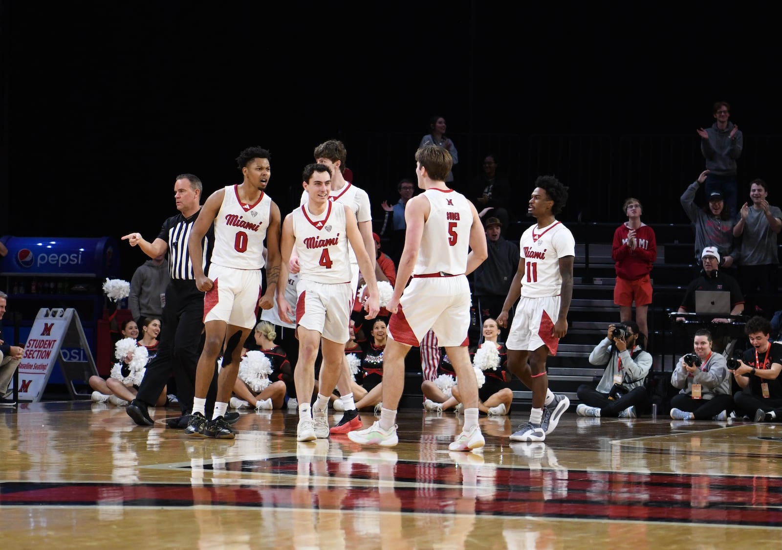 Miami's Kam Craft (4) celebrates with teammate Peter Suder (5) during Tuesday night's game vs. Toledo. Miami Athletics photo