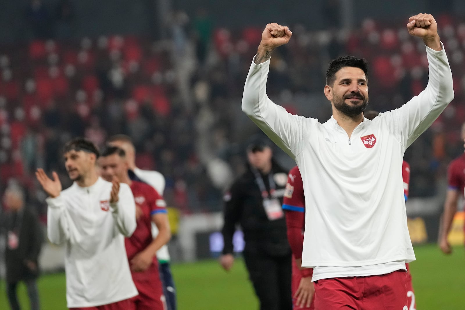 Serbia's Aleksandar Mitrovic celebrates after the UEFA Nations League soccer match between Serbia and Switzerland at the Dubocica Stadium in Leskovac, Serbia, Saturday, Oct. 12, 2024. (AP Photo/Darko Vojinovic)