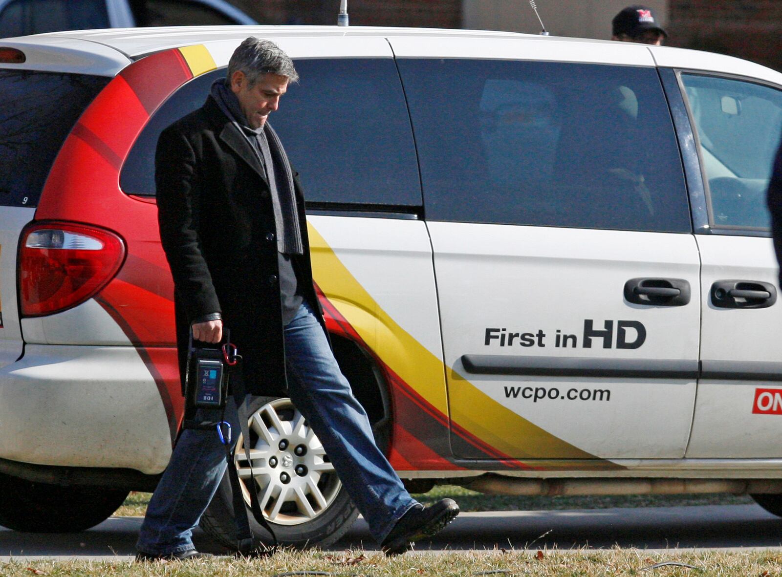 Director George Clooney paces off a distance for a scene outside The Farmer School of Business during filming of "Ides of March" Tuesday, March 1, 2011 on the Miami University campus in Oxford, Ohio.   Staff photo by Nick Graham