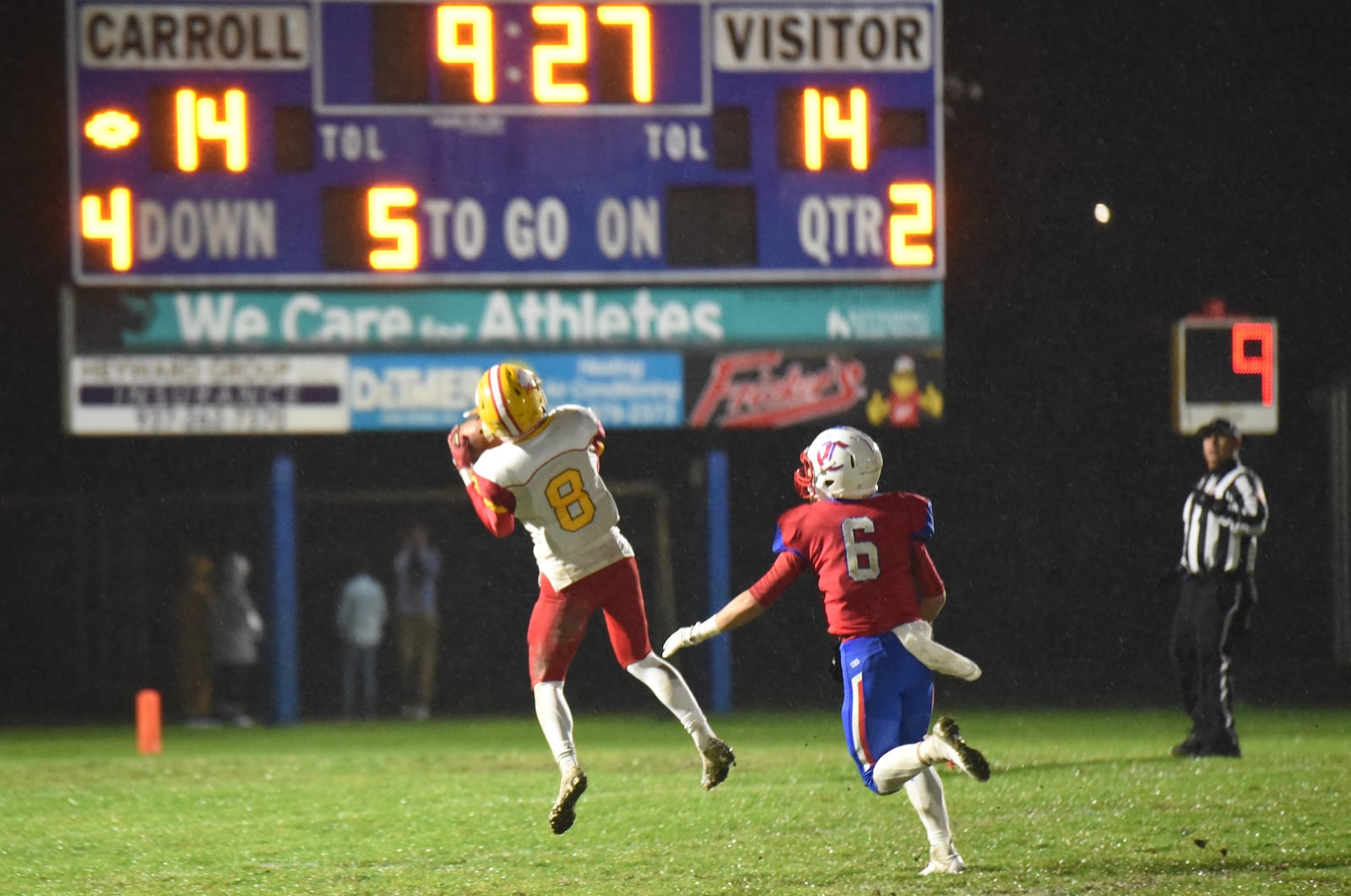 Fenwick’s Gio DiGirolamo comes up with an interception on a pass intended for Carroll’s Sam Severt during a 42-41 victory for FHS in Riverside on Friday. CONTRIBUTED PHOTO BY ANGIE MOHRHAUS