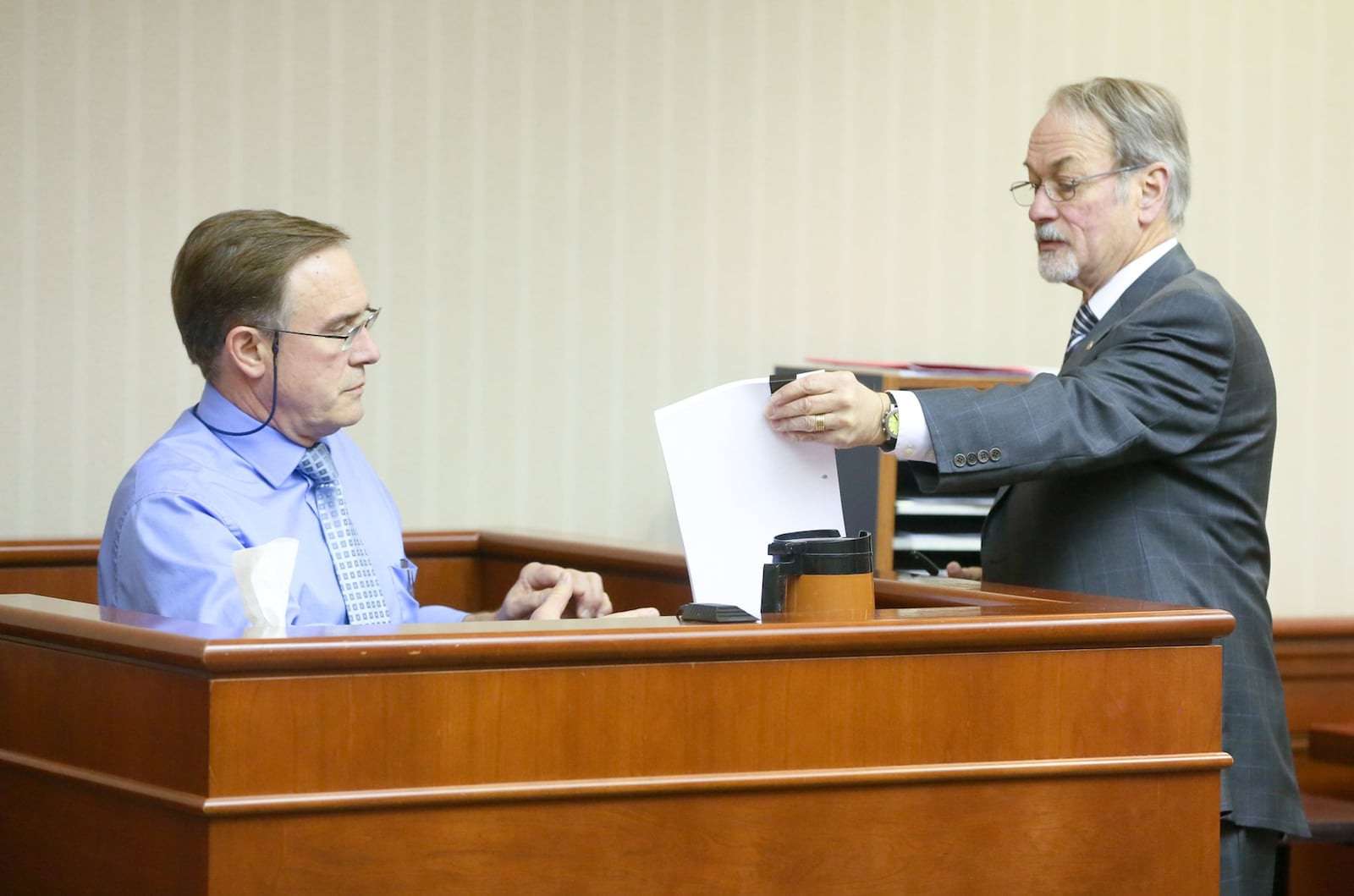 Dr. Rick Bucher, who is charged with multiple counts of drug trafficking, took the stand Wednesday, March 23, in his trial in Butler County Common Pleas Court. GREG LYNCH/STAFF