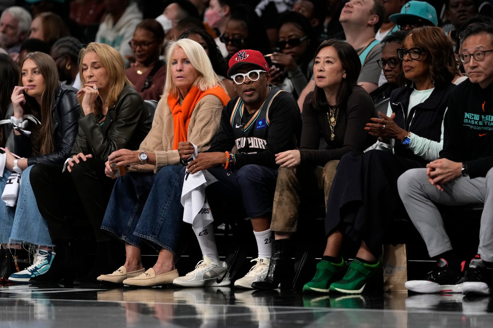 Spike Lee watches the first half of Game 1 of a WNBA basketball final playoff series between the New York Liberty and the Minnesota Lynx, Thursday, Oct. 10, 2024, in New York. (AP Photo/Pamela Smith)