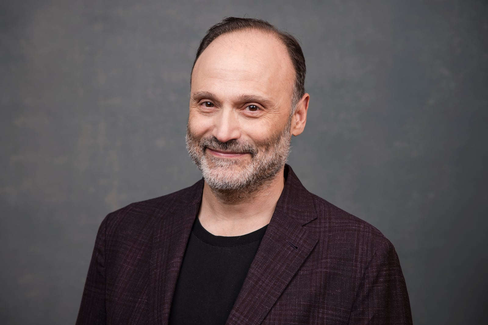 FILE - Steven Molaro poses for a portrait to promote "Georgie & Mandy's First Marriage" during the Summer Television Critics Association Press Tour in Pasadena, Calif., on July 13, 2024. (Willy Sanjuan/Invision/AP, File)