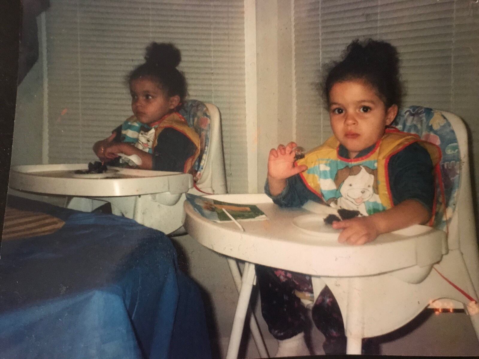 Alexis on left in a high chair and Alexandra on right. CONTRIBUTED