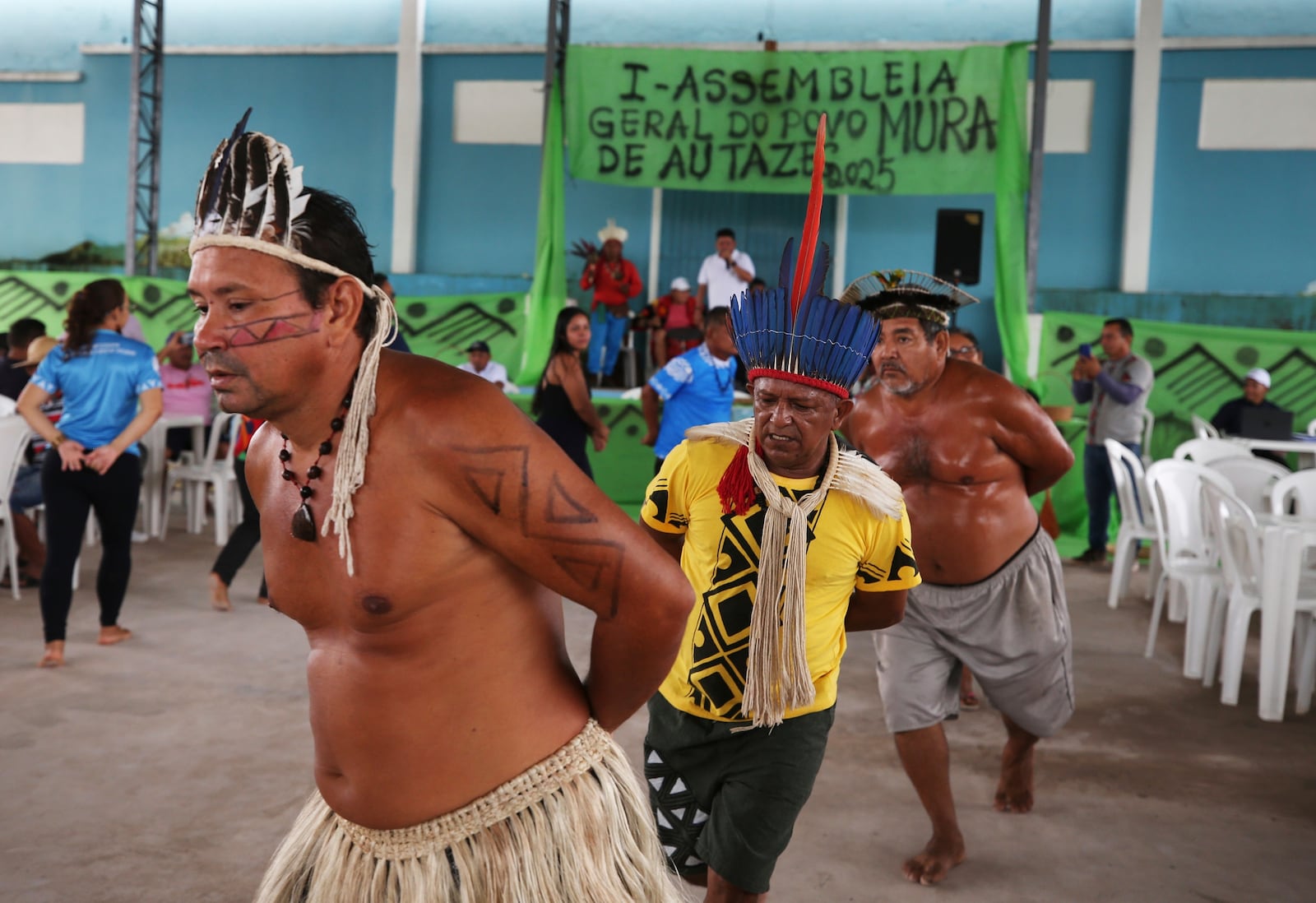 Mura Indigenous people perform traditional dance during the opening of a gathering in Autazes, Amazonas state, Brazil, Wednesday, Feb. 19, 2025. (AP Photo/Edmar Barros)