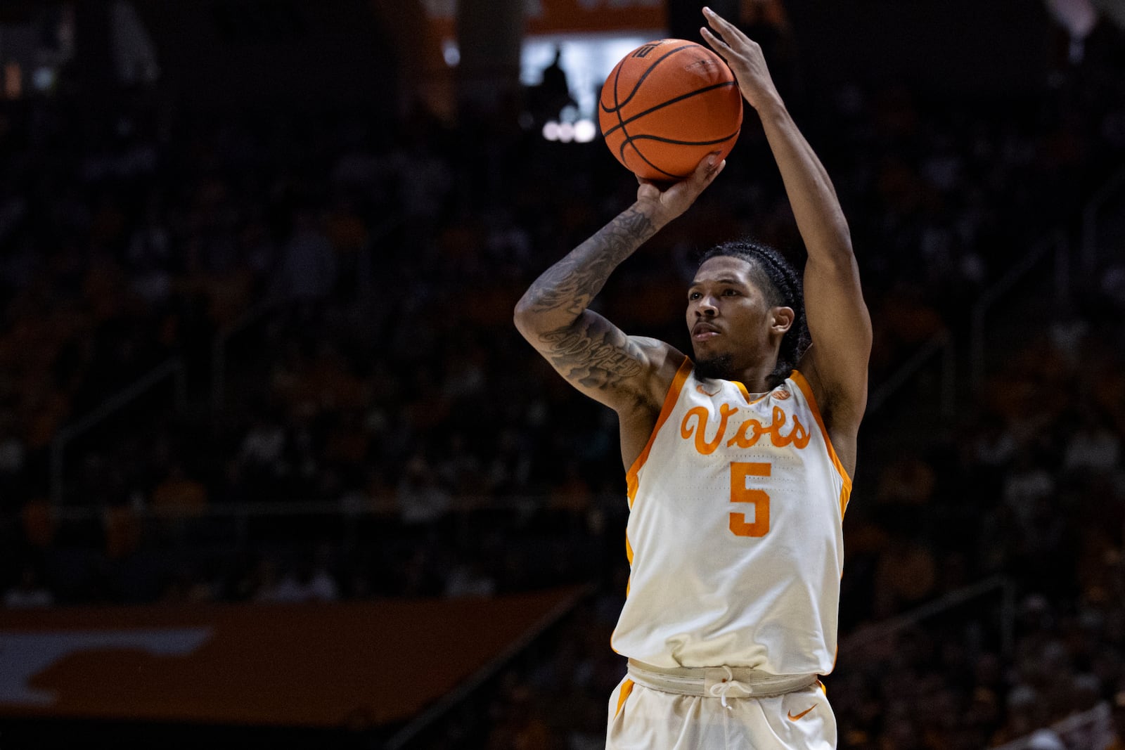 Tennessee guard Zakai Zeigler (5) shoots a 3-point shot during the first half of an NCAA college basketball game against Arkansas, Saturday, Jan. 4, 2025, in Knoxville, Tenn. (AP Photo/Wade Payne)