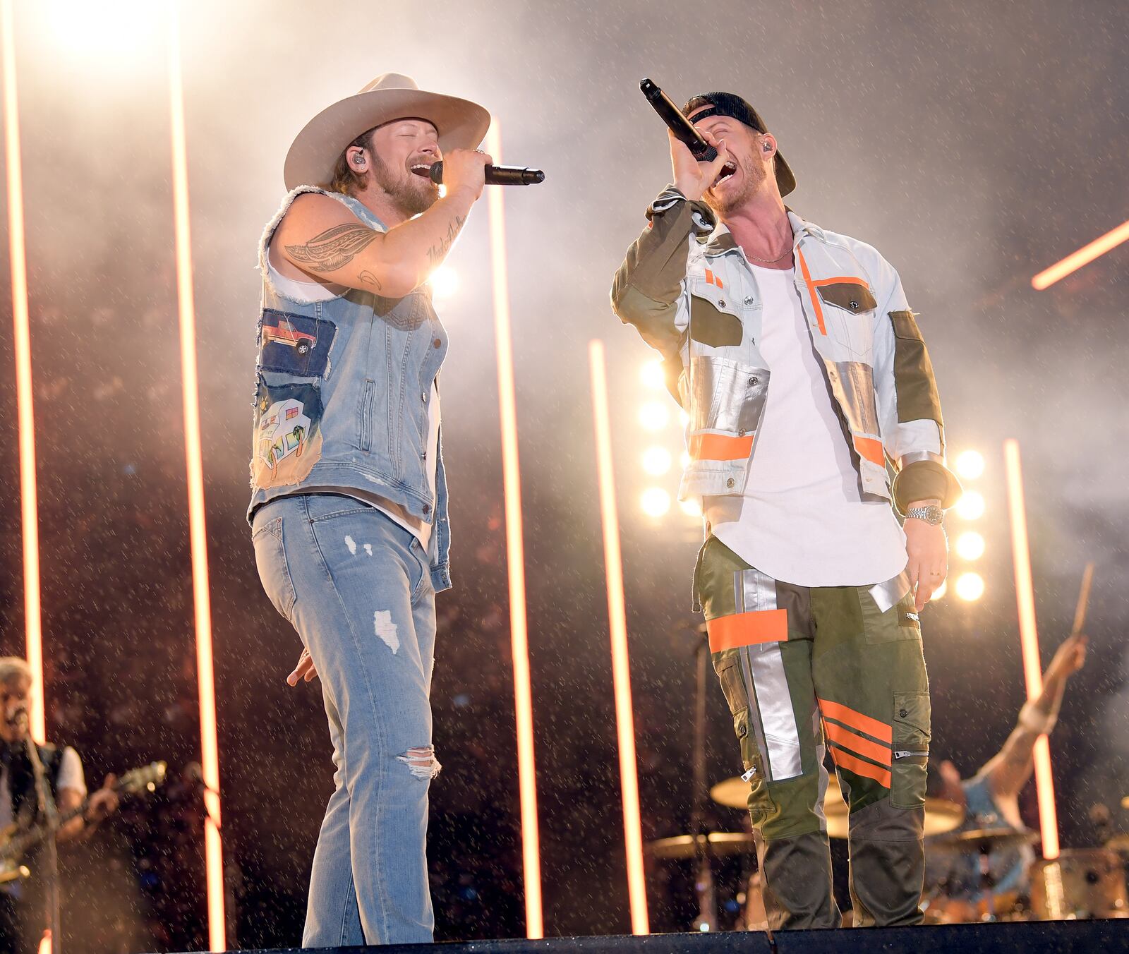 NASHVILLE, TENNESSEE - JUNE 06: (EDITORIAL USE ONLY) Brian Kelley and Tyler Hubbard of Florida Georgia Line perform on stage during day 1 of 2019 CMA Music Festival on June 06, 2019 in Nashville, Tennessee. (Photo by Jason Kempin/Getty Images)