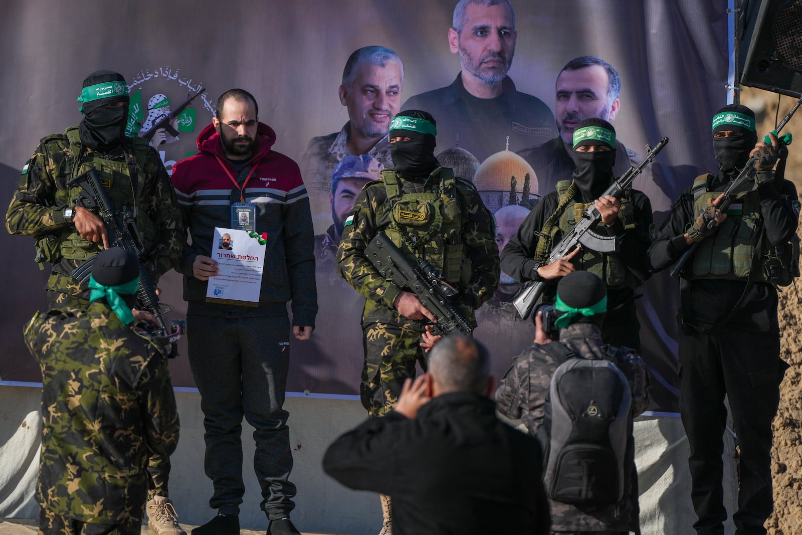 Israeli Yarden Bibas, 34, who has been held hostage by Hamas in Gaza since October 7, 2023, poses for pictures before being escorted by Hamas fighters before being handed over to the Red Cross in Khan Younis, southern Gaza Strip, Saturday Feb. 1, 2025. Photo/Abdel Kareem)