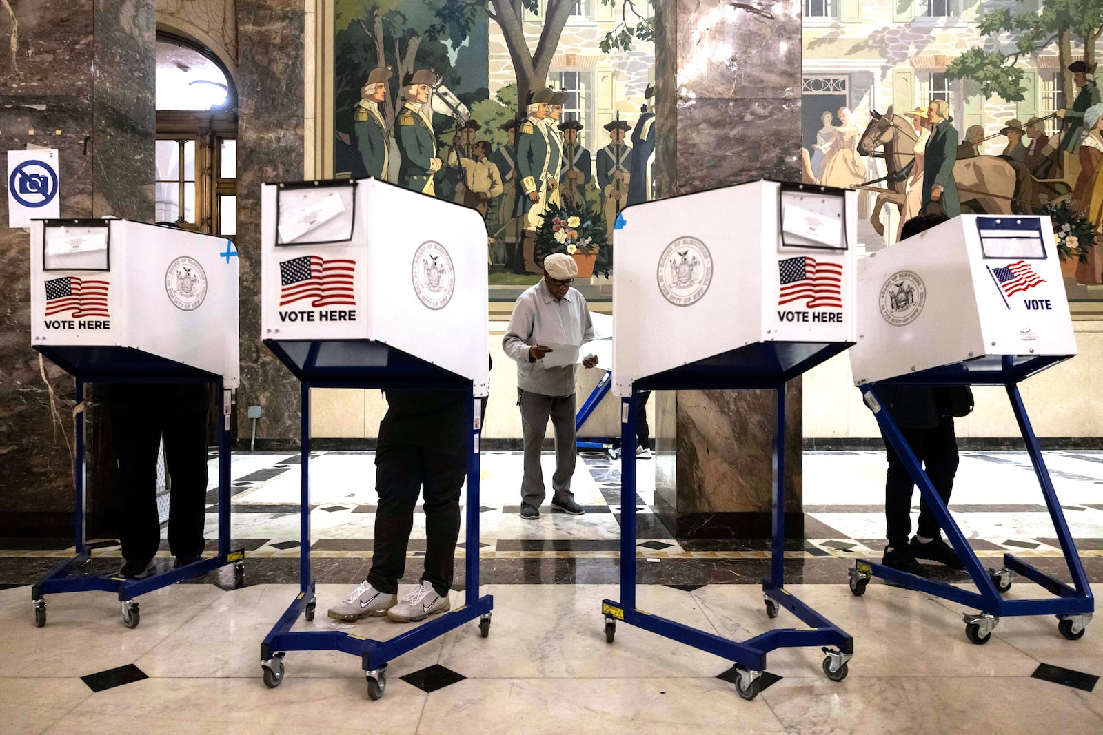 Voters cast their ballots at the Bronx County Supreme Court in New York on Election Day, Tuesday, Nov. 5, 2024. (AP Photo/Yuki Iwamura)