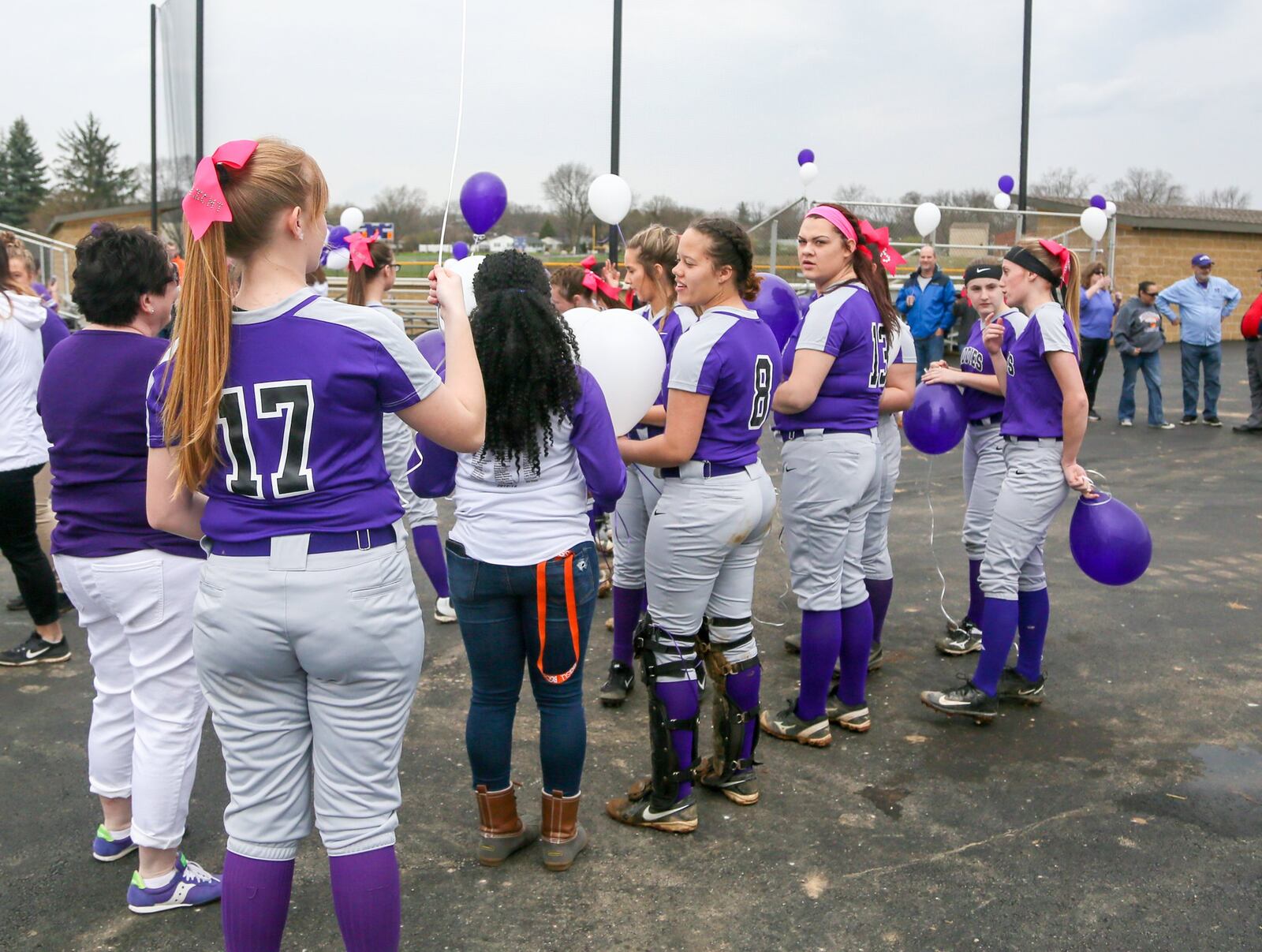 Middletown’s softball team prepares for the Opening Day ceremonies Monday at Lefferson Park in Middletown. GREG LYNCH/STAFF