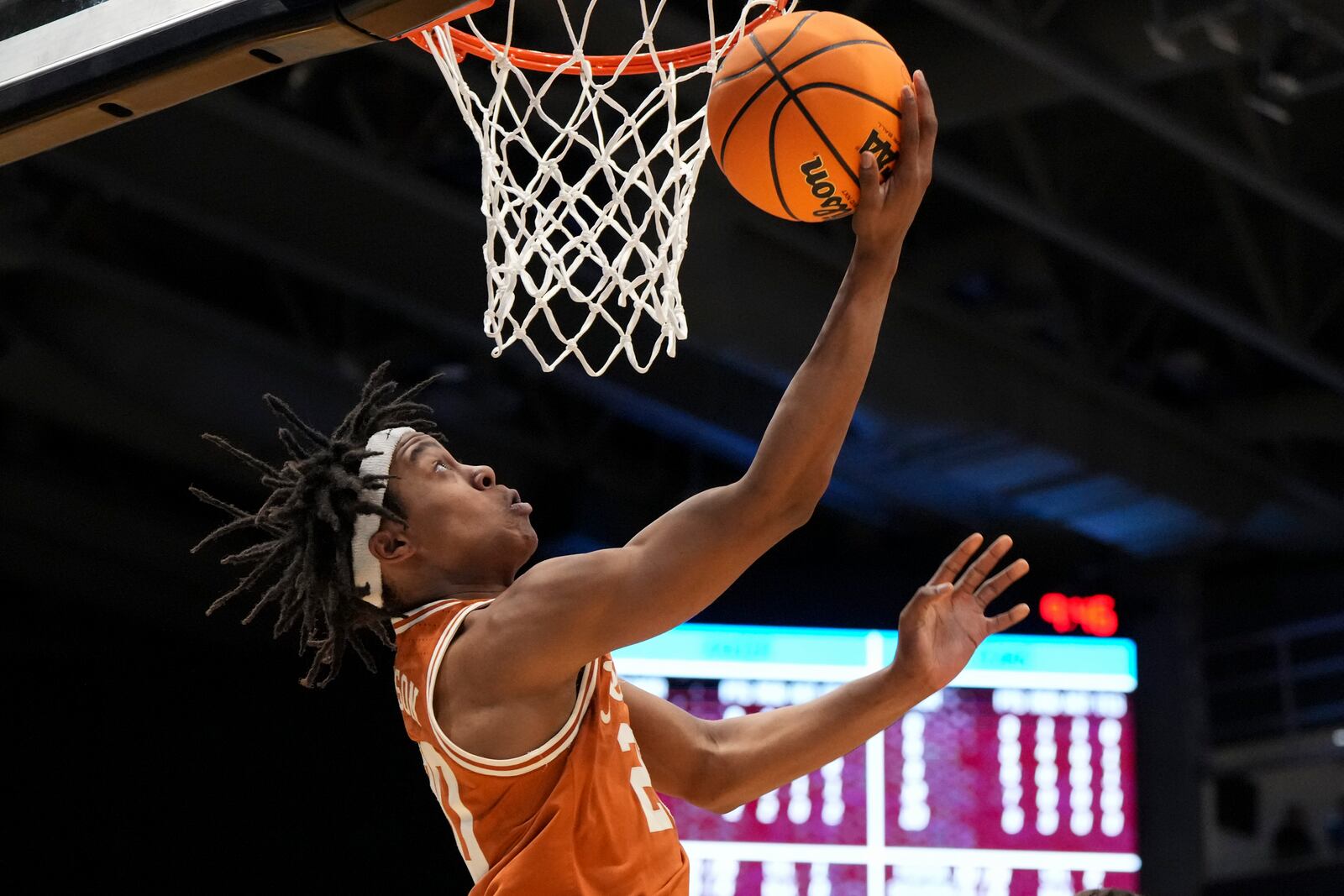 Texas' Tre Johnson shoots during the first half of a First Four college basketball game against Xavier in the NCAA Tournament, Wednesday, March 19, 2025, in Dayton, Ohio. (AP Photo/Jeff Dean)