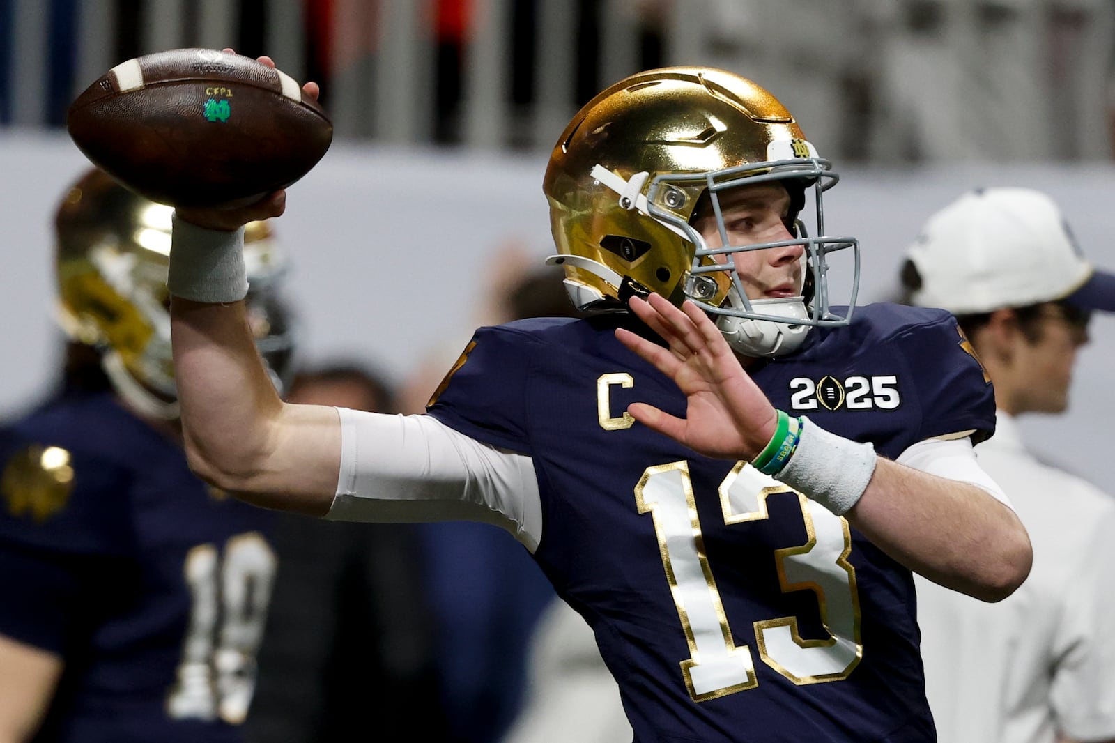 Notre Dame quarterback Riley Leonard warms up before the College Football Playoff national championship game between Ohio State and Notre Dame Monday, Jan. 20, 2025, in Atlanta. (AP Photo/Butch Dill)