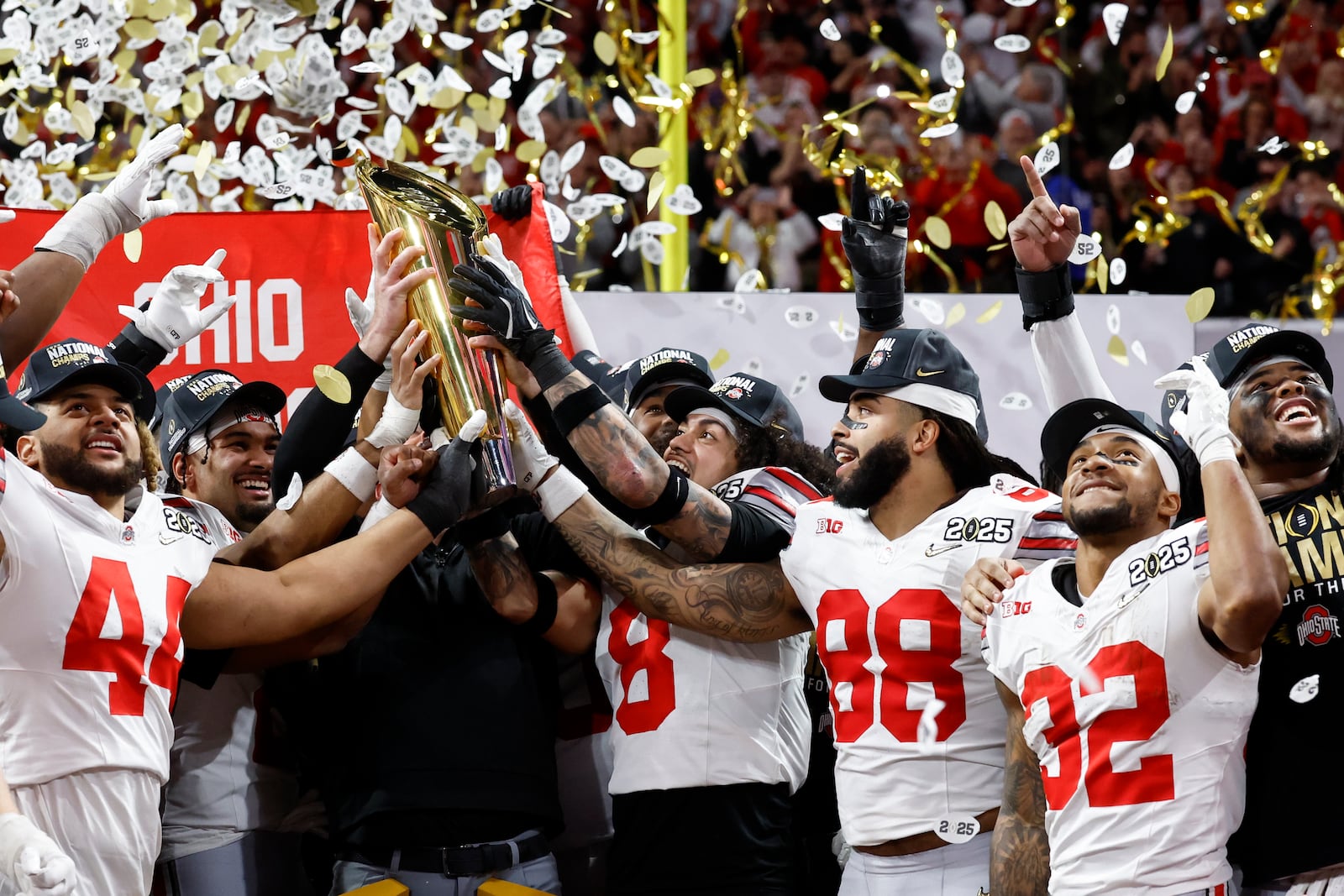 Ohio State celebrates after their win against Notre Dame in the College Football Playoff national championship game Monday, Jan. 20, 2025, in Atlanta. (AP Photo/Butch Dill)