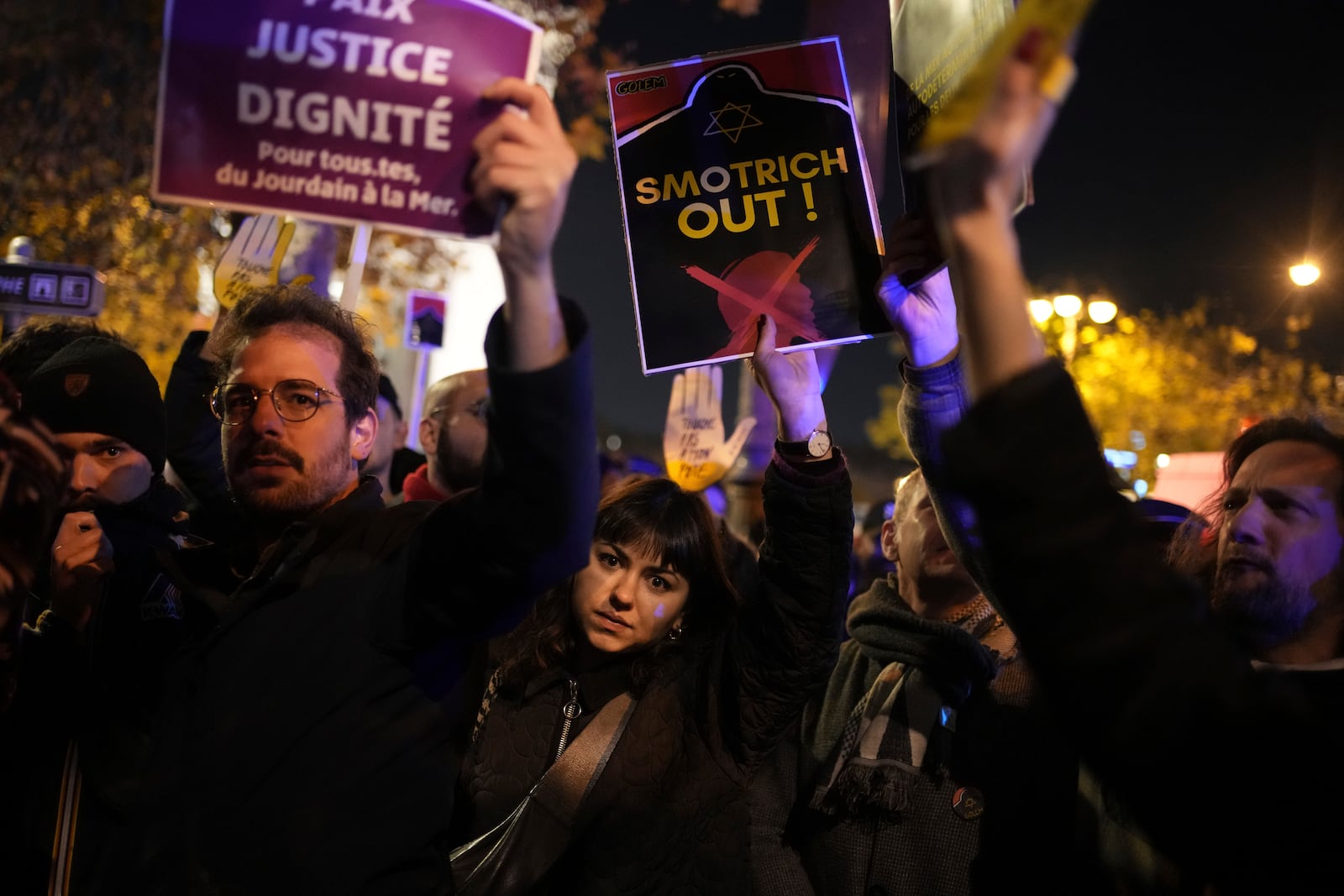 Protestors take part in a rally against the "Israel is Forever" gala organized by far-right Franco-Israeli figures, in Paris, Wednesday, Nov. 13, 2024, on the eve of the UEFA Nations League 2025 soccer match between France and Israel. (AP Photo/Christophe Ena)