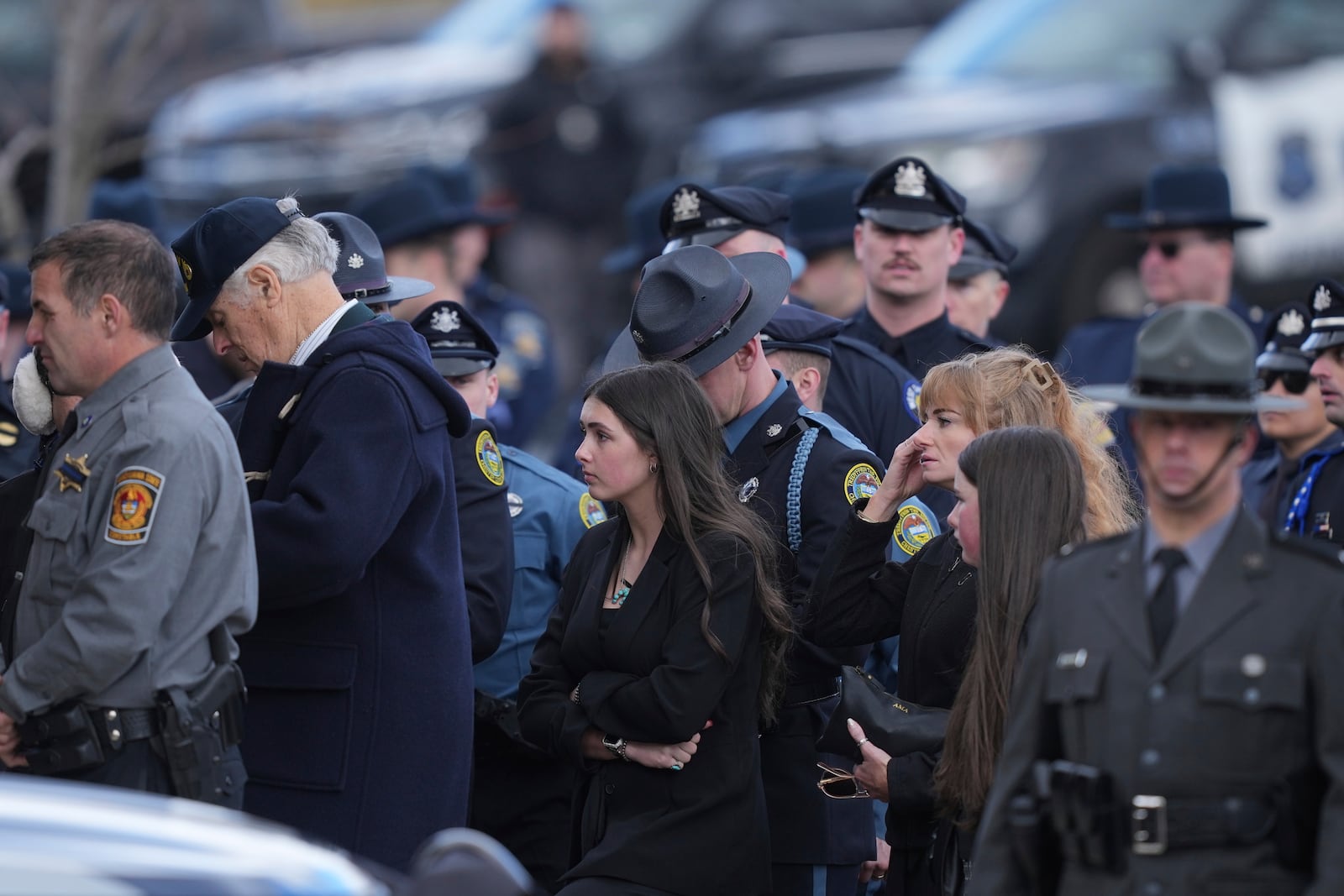 Mourners enter the church for the funeral of West York Borough Police Officer Andrew Duarte at Living Word Community Church, in Red Lion, Pa., Friday, Feb. 28, 2025. (AP Photo/Matt Rourke)