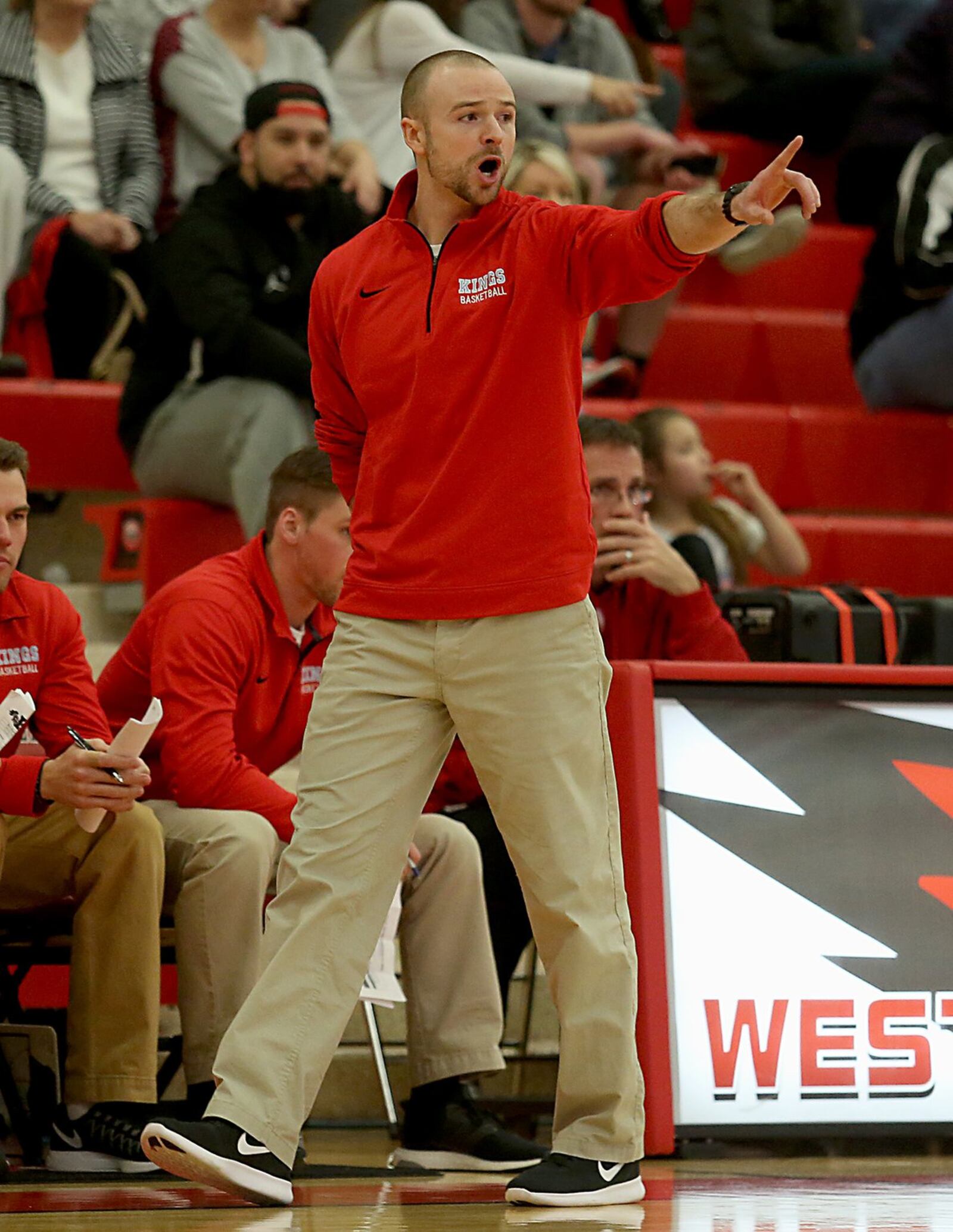 Kings coach Nick Molz calls a play during Wednesday night’s Division I sectional game against Lakota East at Lakota West. CONTRIBUTED PHOTO BY E.L. HUBBARD