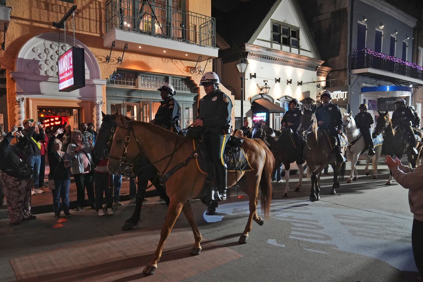 Mounted police patrol along Bourbon Street in the French Quarter, Thursday, Jan. 2, 2025 in New Orleans. (AP Photo/George Walker IV)